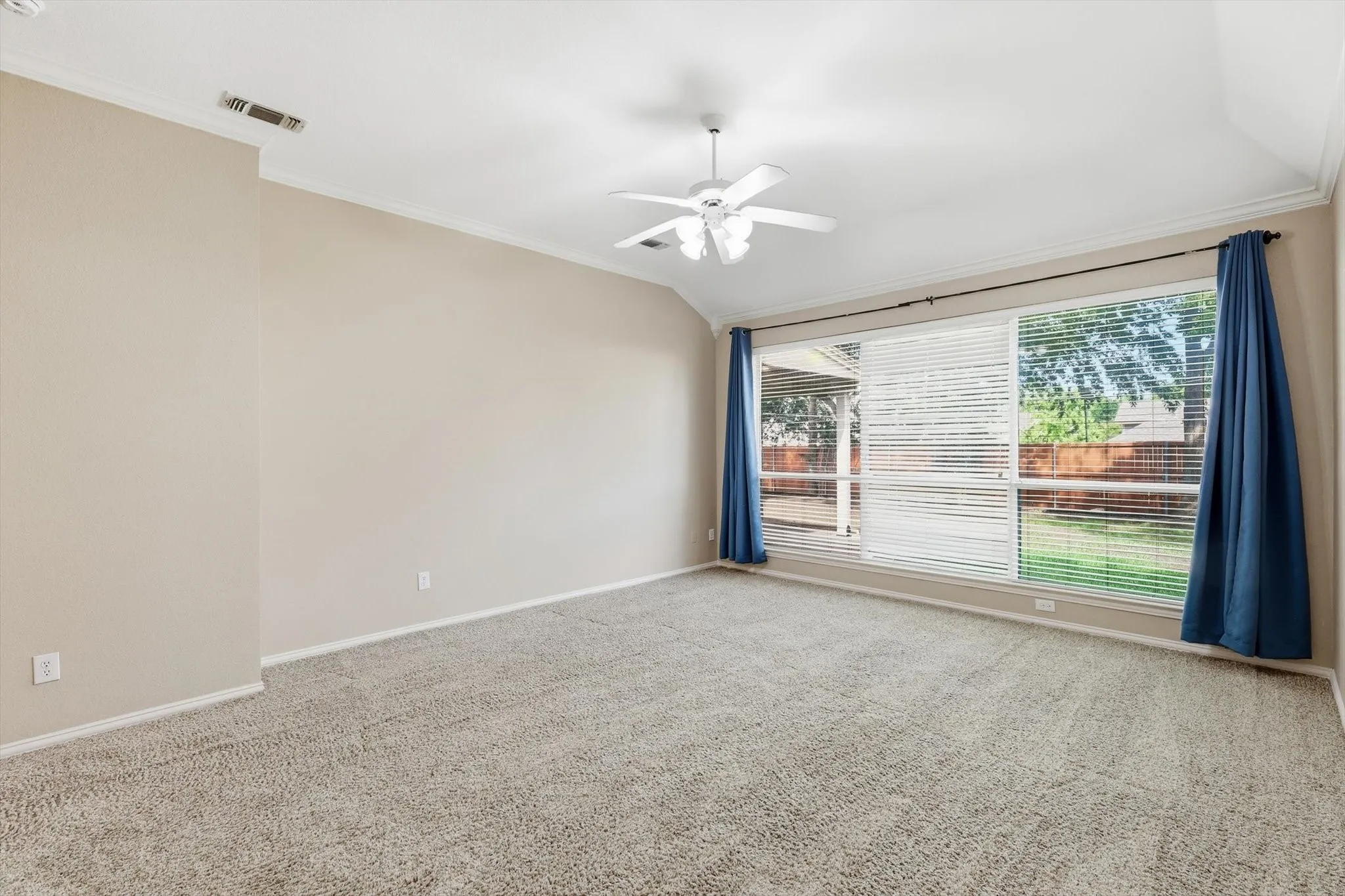 Spacious Master Bedroom looking out to the very large backyard