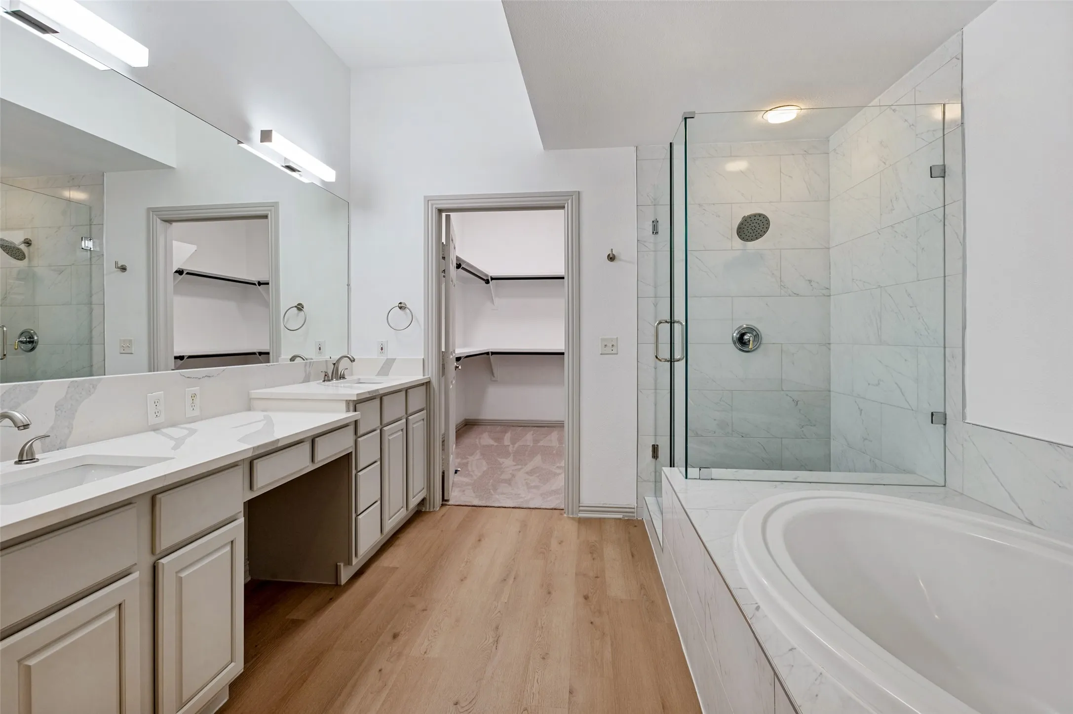 Primary bath with dual sinks.