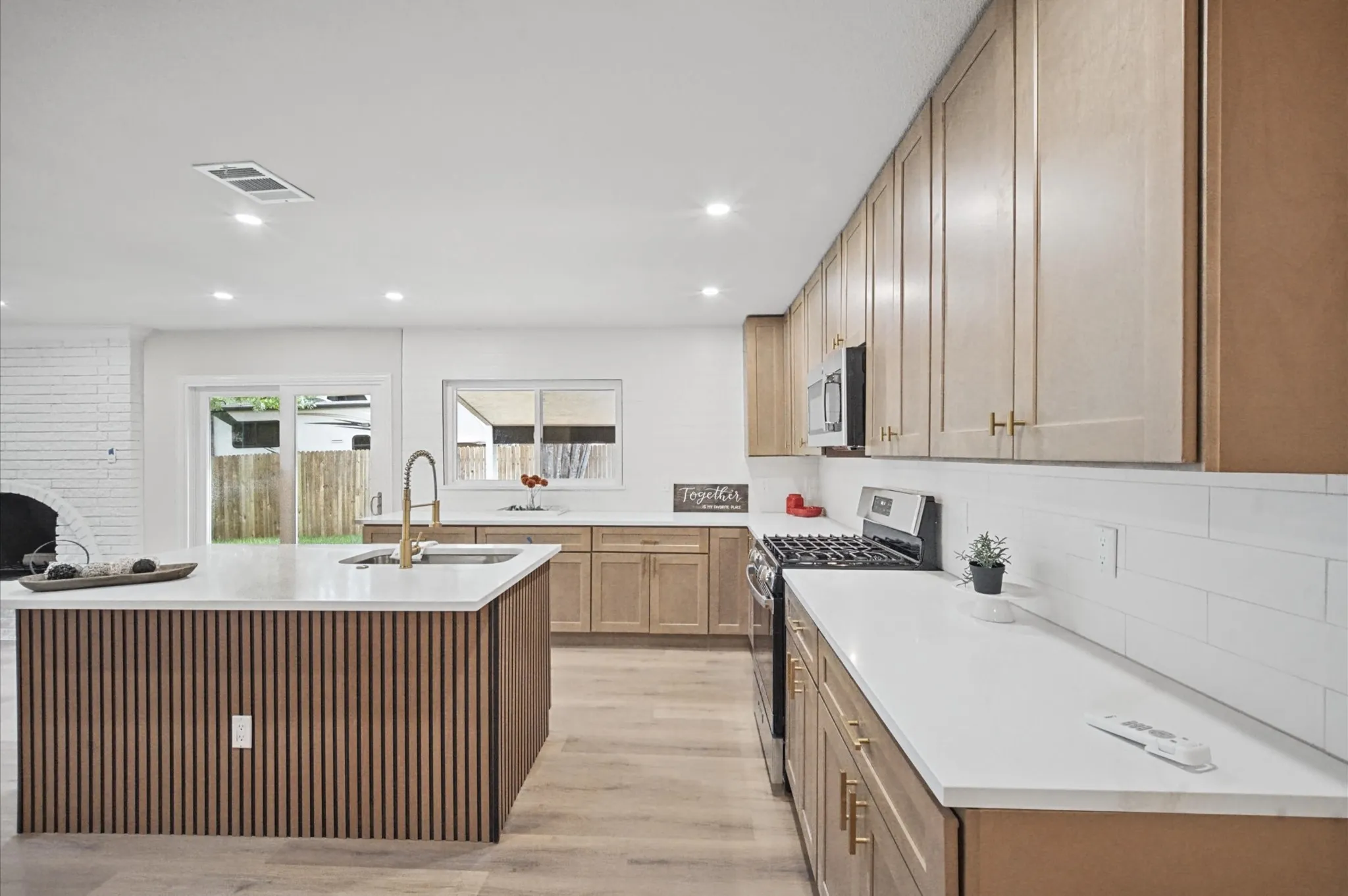 Shaker designer cabinets with quartz countertops
