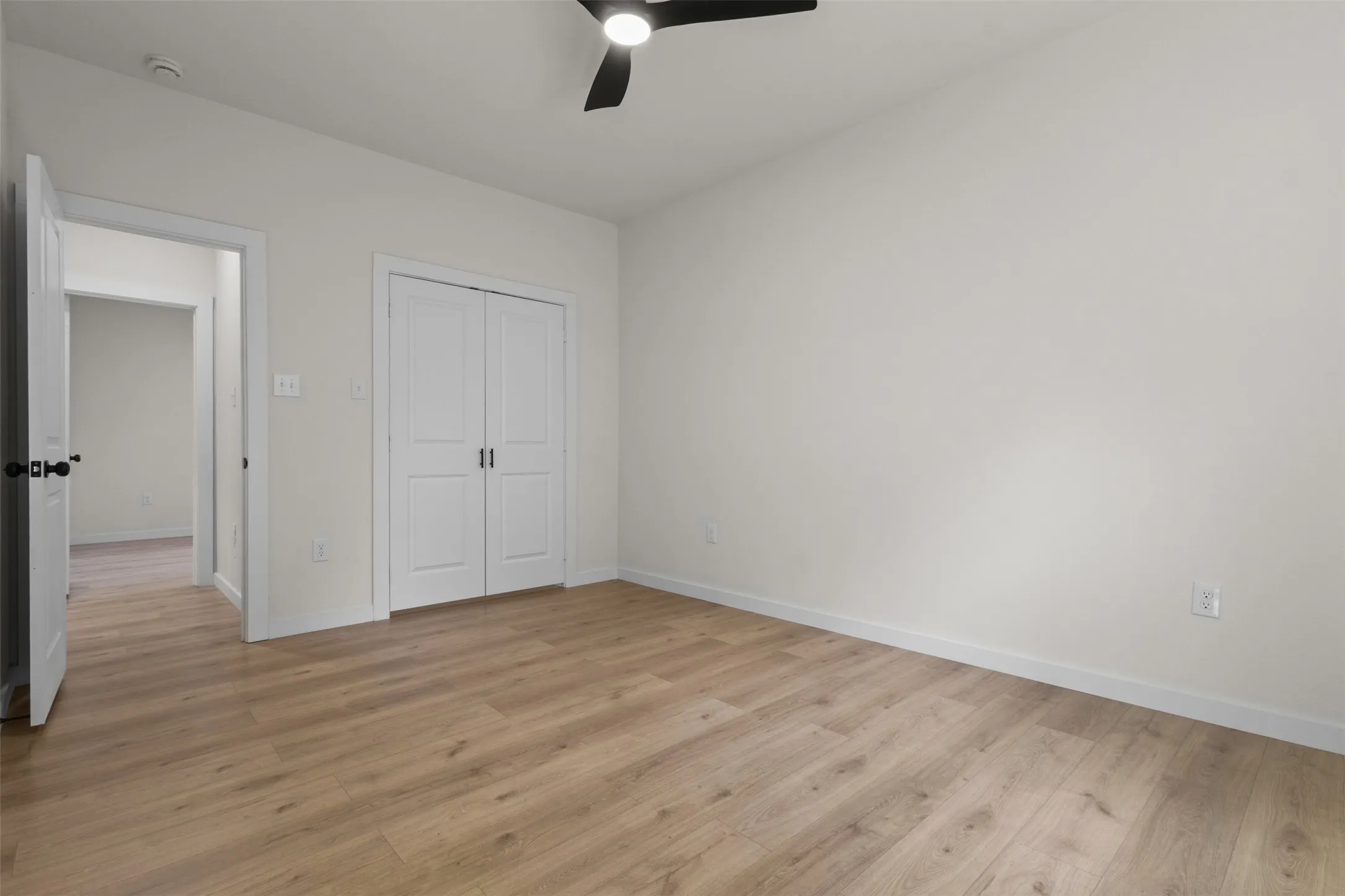 Neutral paint palette with wood-finish flooring
