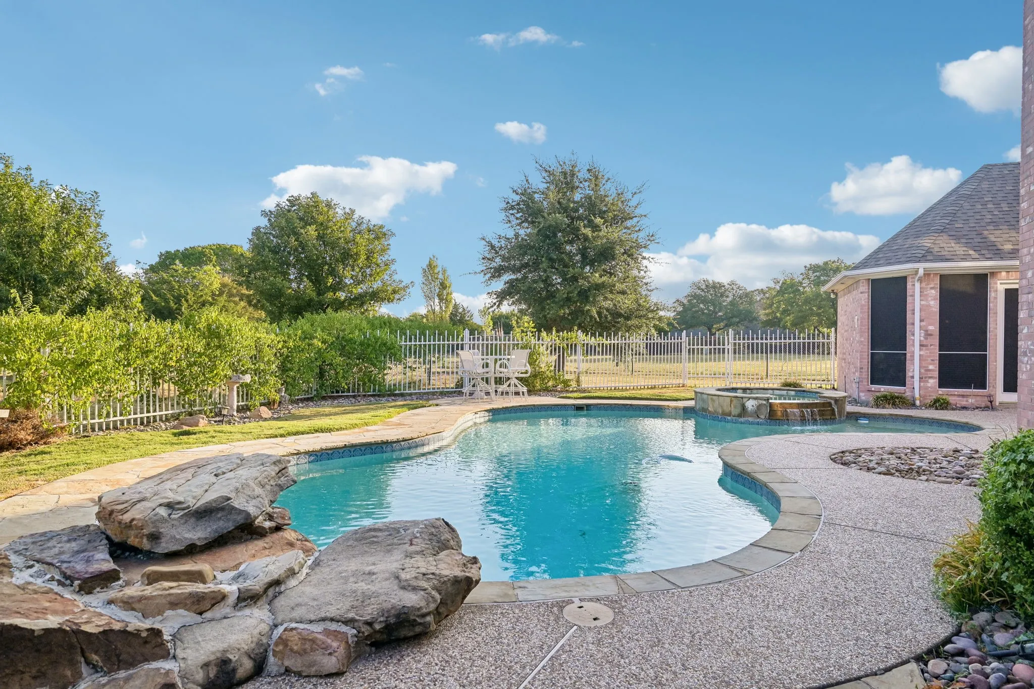 Pool area is fenced from the acreage