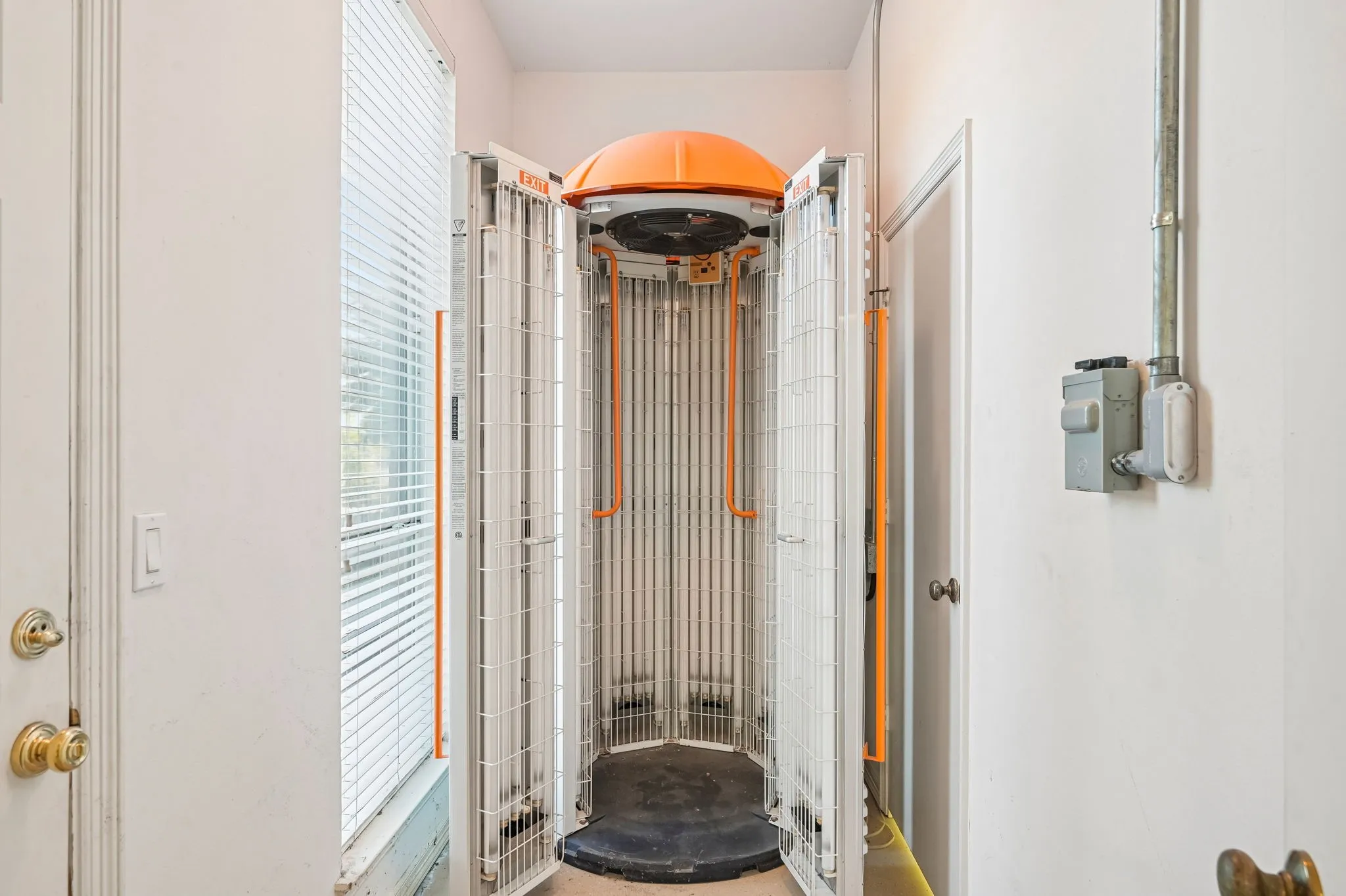 Sun tanning room off pool area