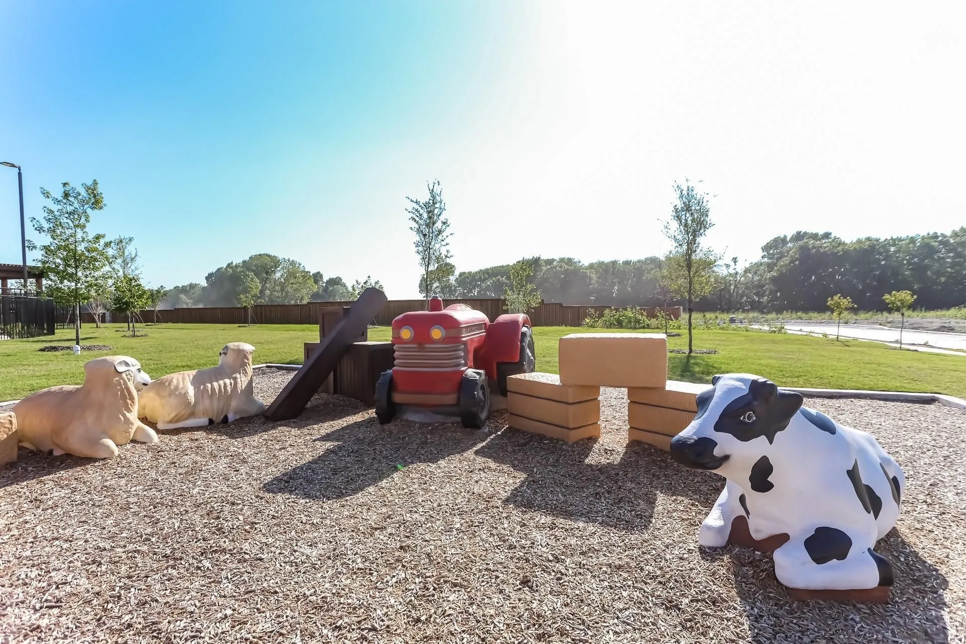 View of playground featuring a lawn