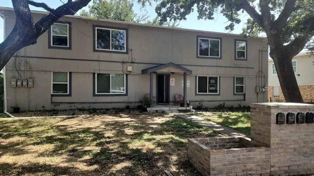 Two-story apartment building.