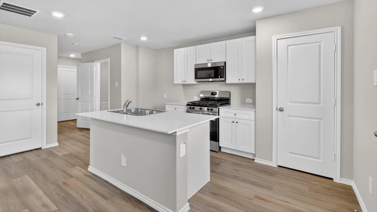 Kitchen - All Home and community information, including pricing, included features, terms, availability and amenities, are subject to change at any time without notice or obligation. All Drawings, pictures, photographs, video, square footages, floor plans, elevations, features, colors and sizes are approximate for illustration purposes only and will vary from the homes as built.
