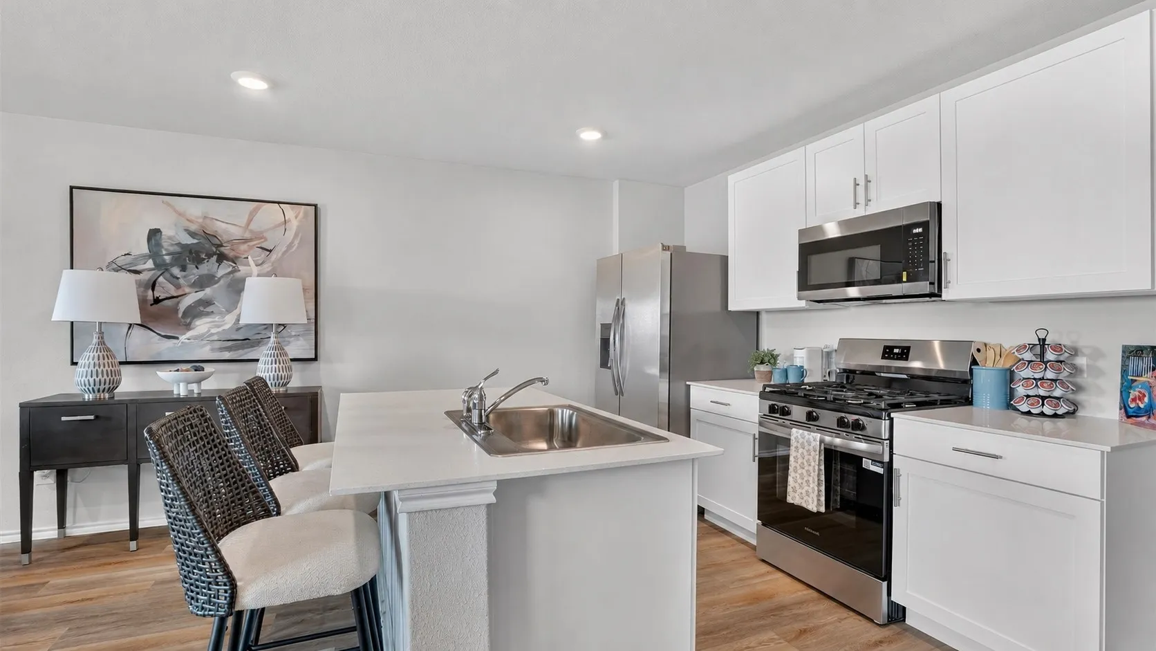 Kitchen - All Home and community information, including pricing, included features, terms, availability and amenities, are subject to change at any time without notice or obligation. All Drawings, pictures, photographs, video, square footages, floor plans, elevations, features, colors and sizes are approximate for illustration purposes only and will vary from the homes as built.
