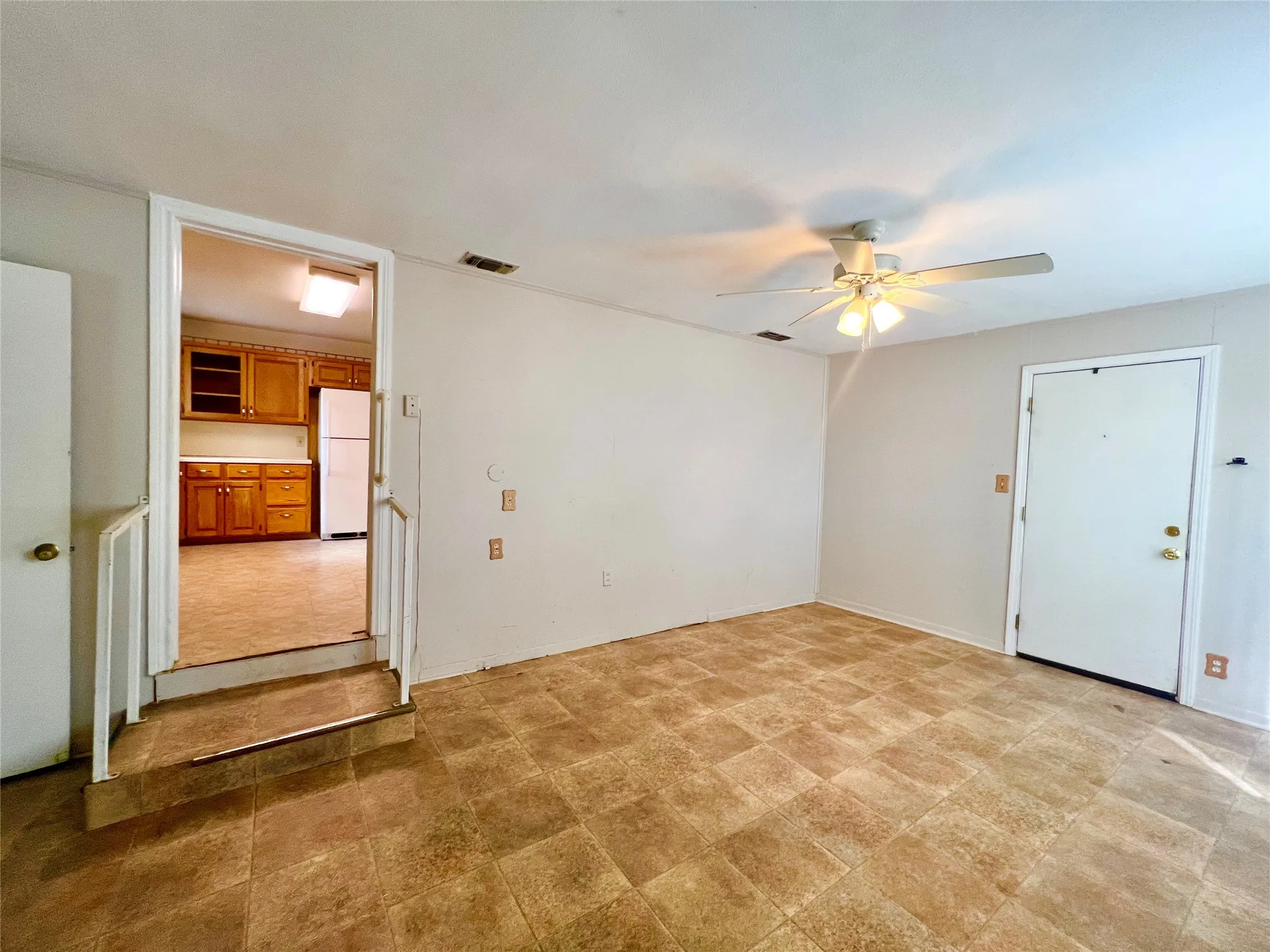 Bedroom #3 Exterior door entrance, step up to the kitchen