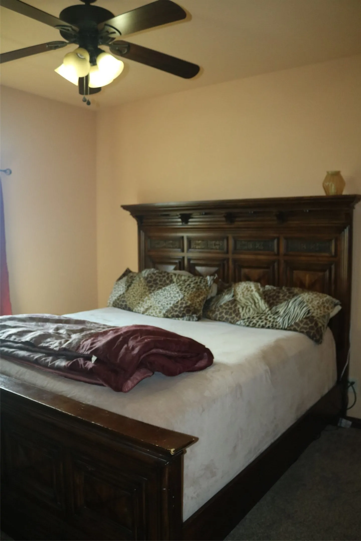 Recessed lighting with a ceiling fan, light-toned wall color, and carpeted flooring