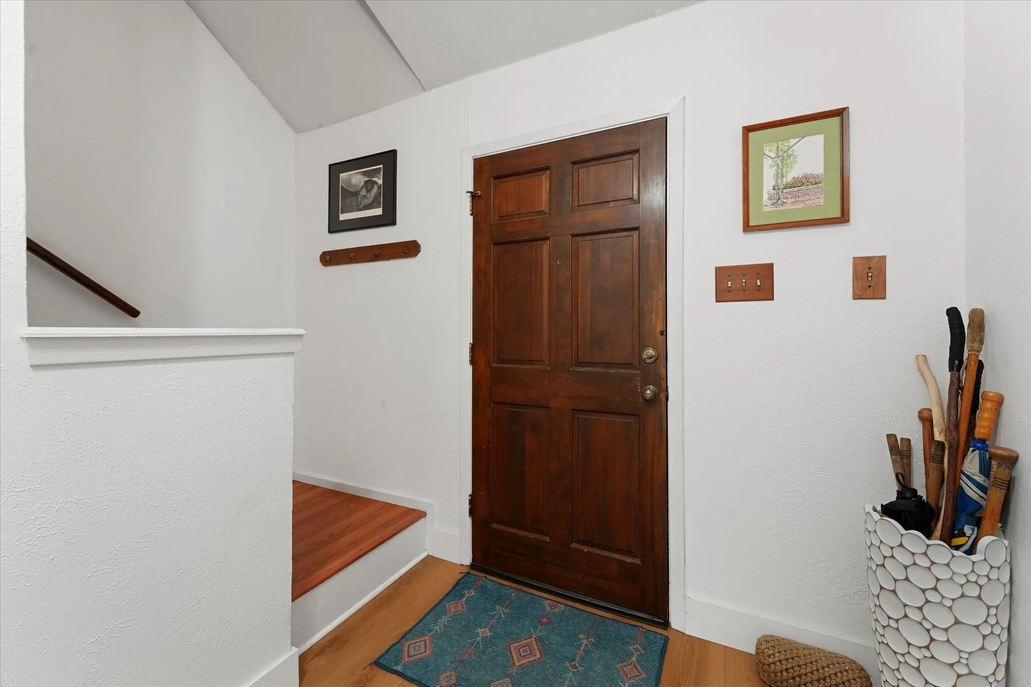 Upper landing between upper two bedrooms and full bath.