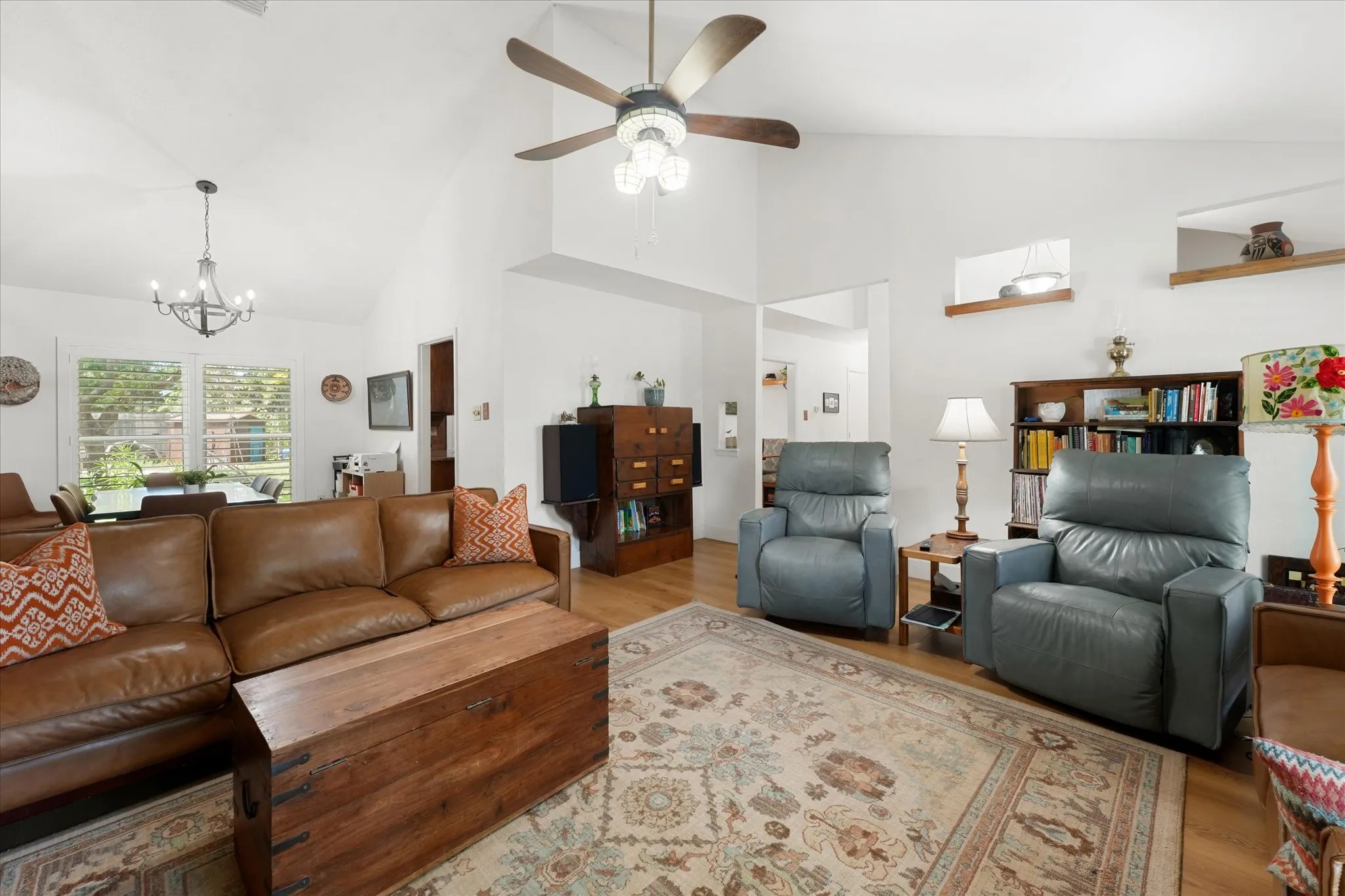 Main living room features new floors throughout, floor to ceiling fireplace, open floor plan, and is very spacious.