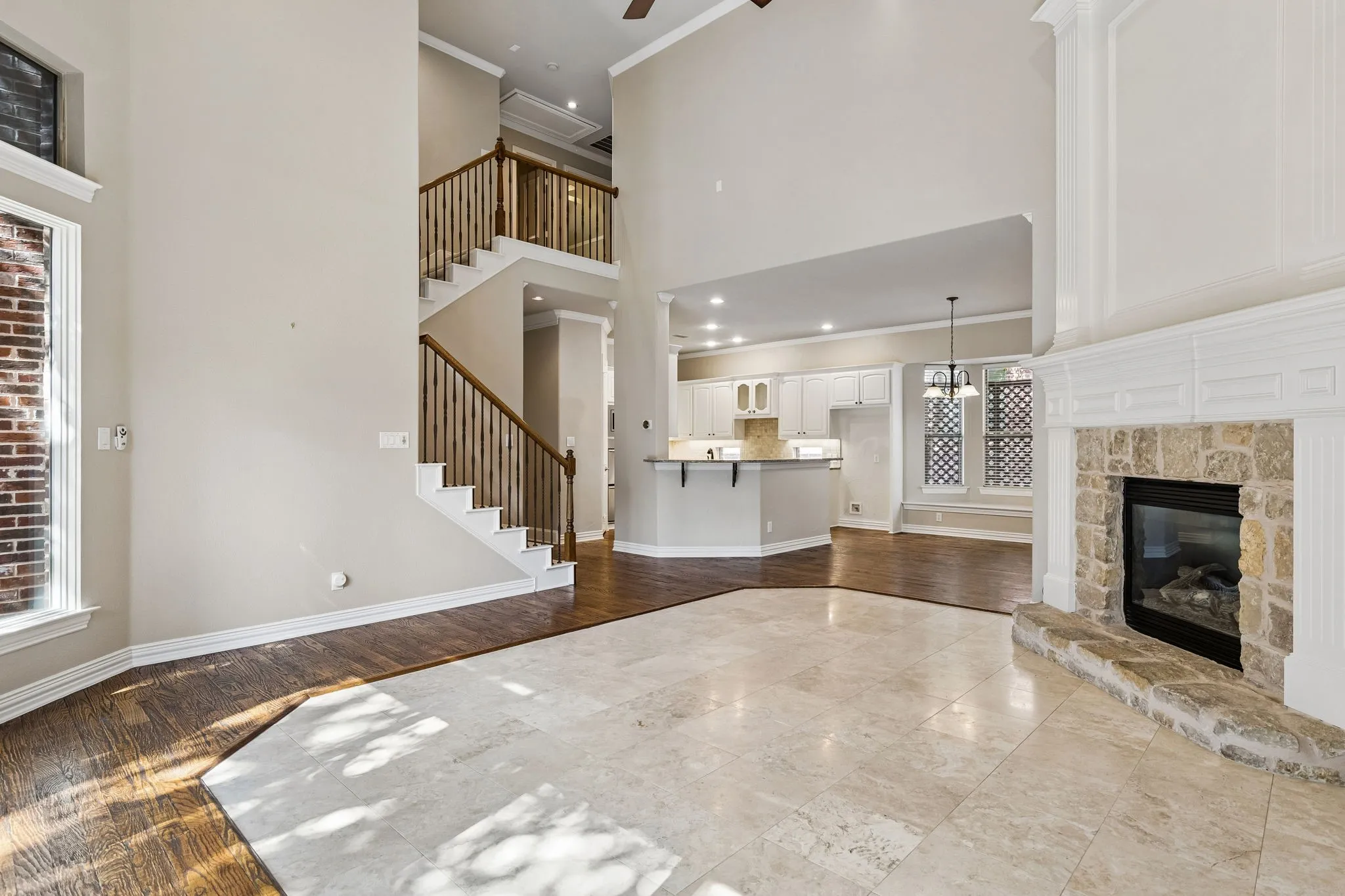 Living Room with gas fireplace and open concept floor plan