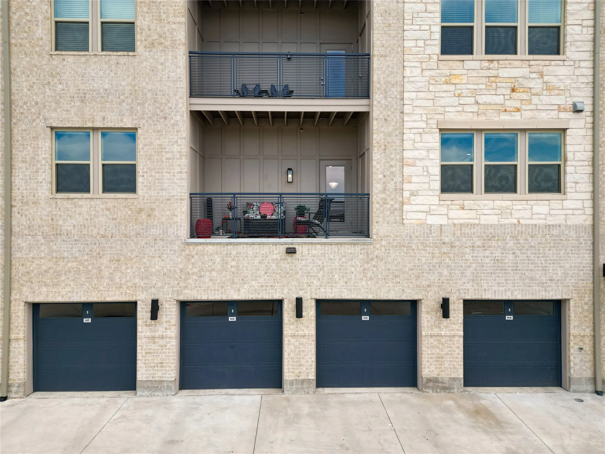 Multi-level building with brick and stone veneer