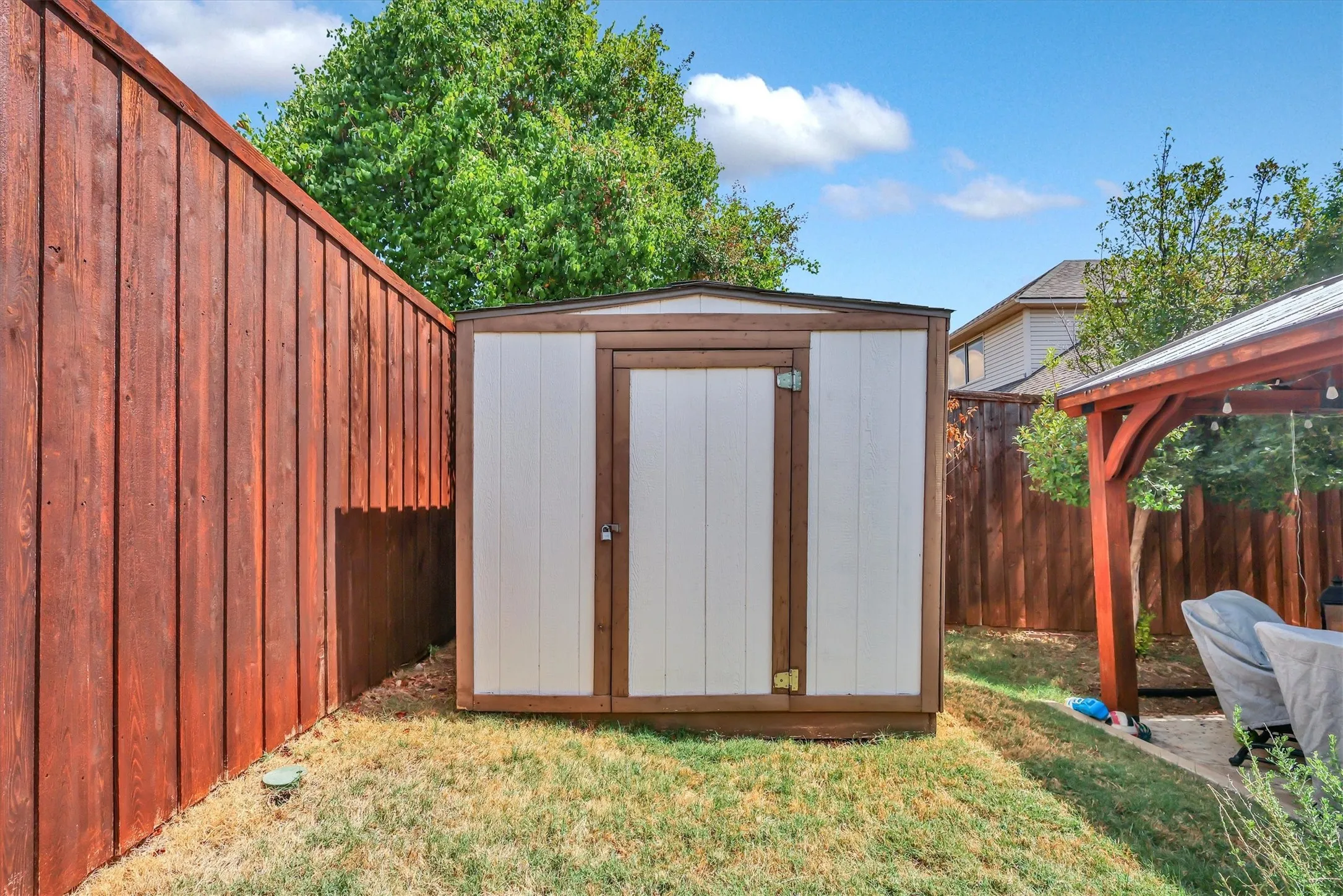 Wood privacy fencing enclosing the perimeter