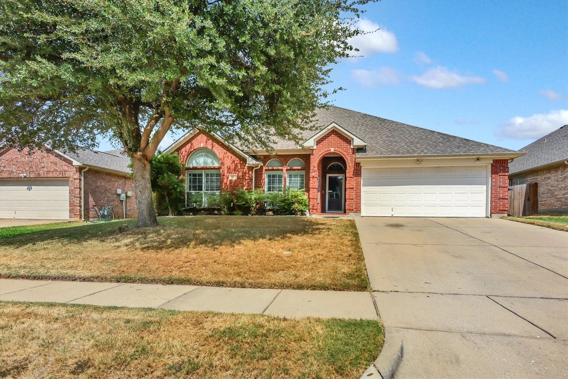 Brick exterior with an arched entryway