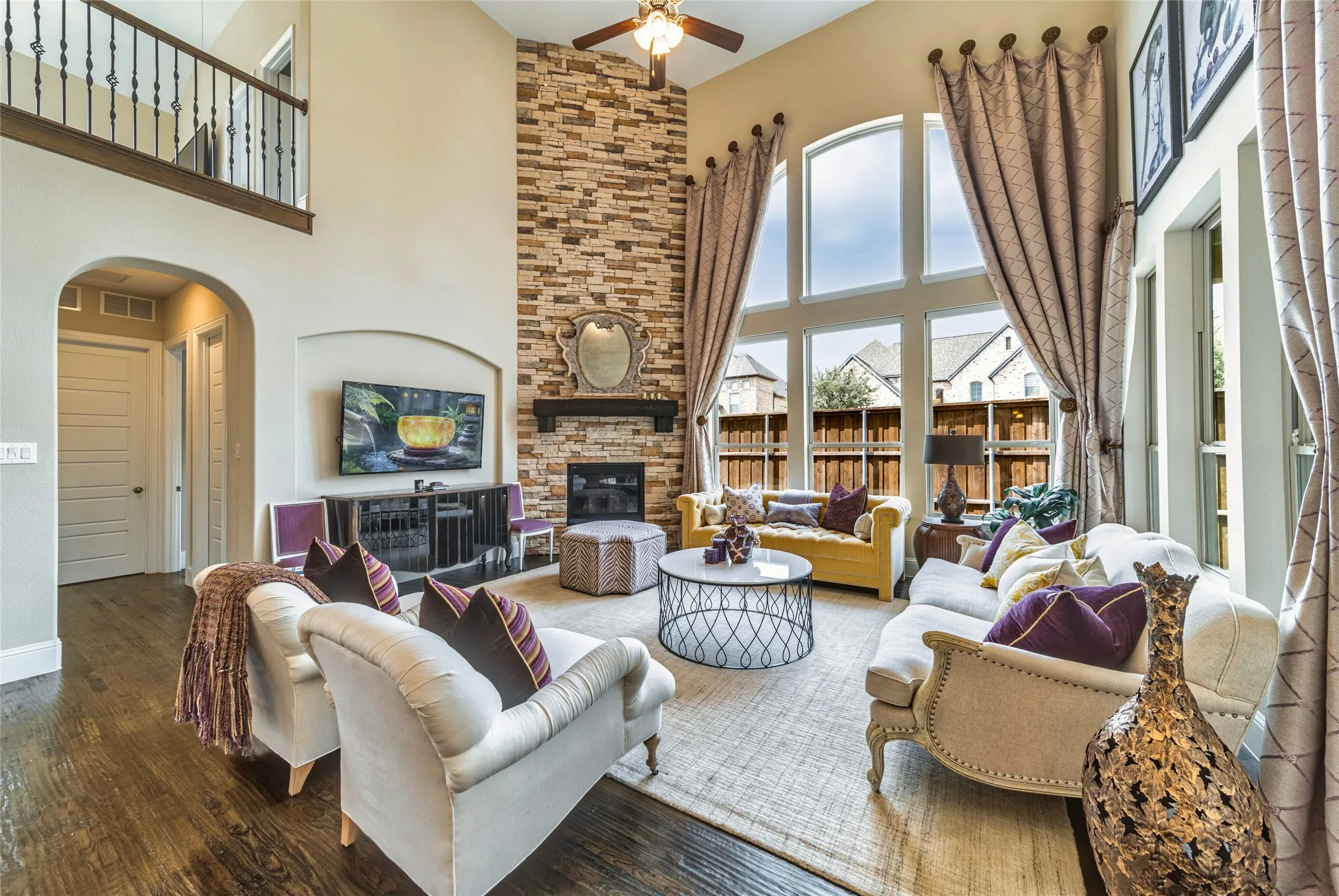 Soaring ceiling with a ceiling fan