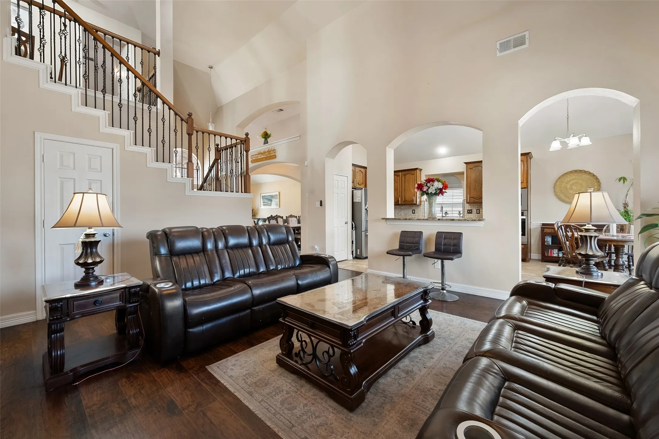 downstairs living area from another view,open to the kitchen