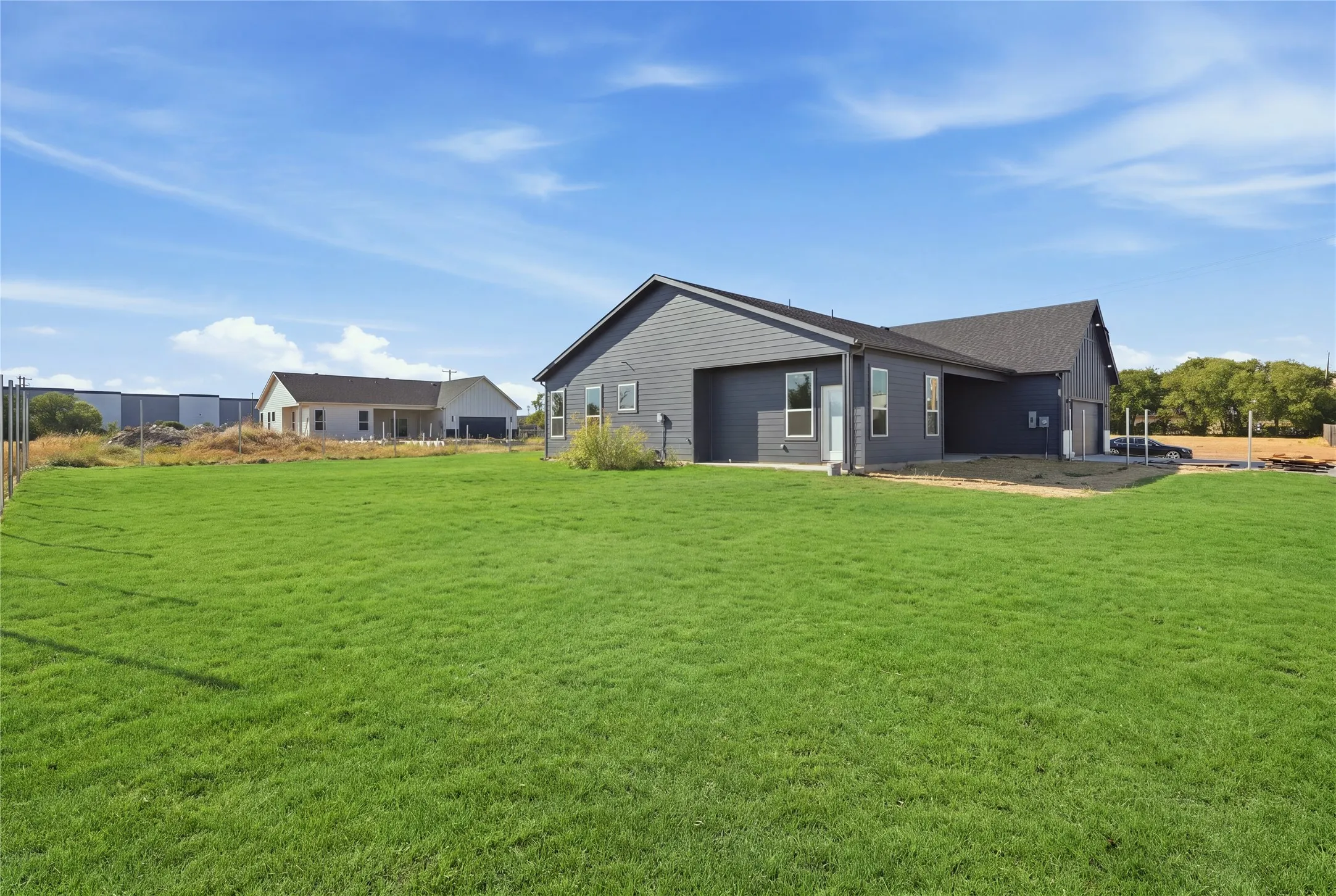 Expansive green lawn provides abundant outdoor space