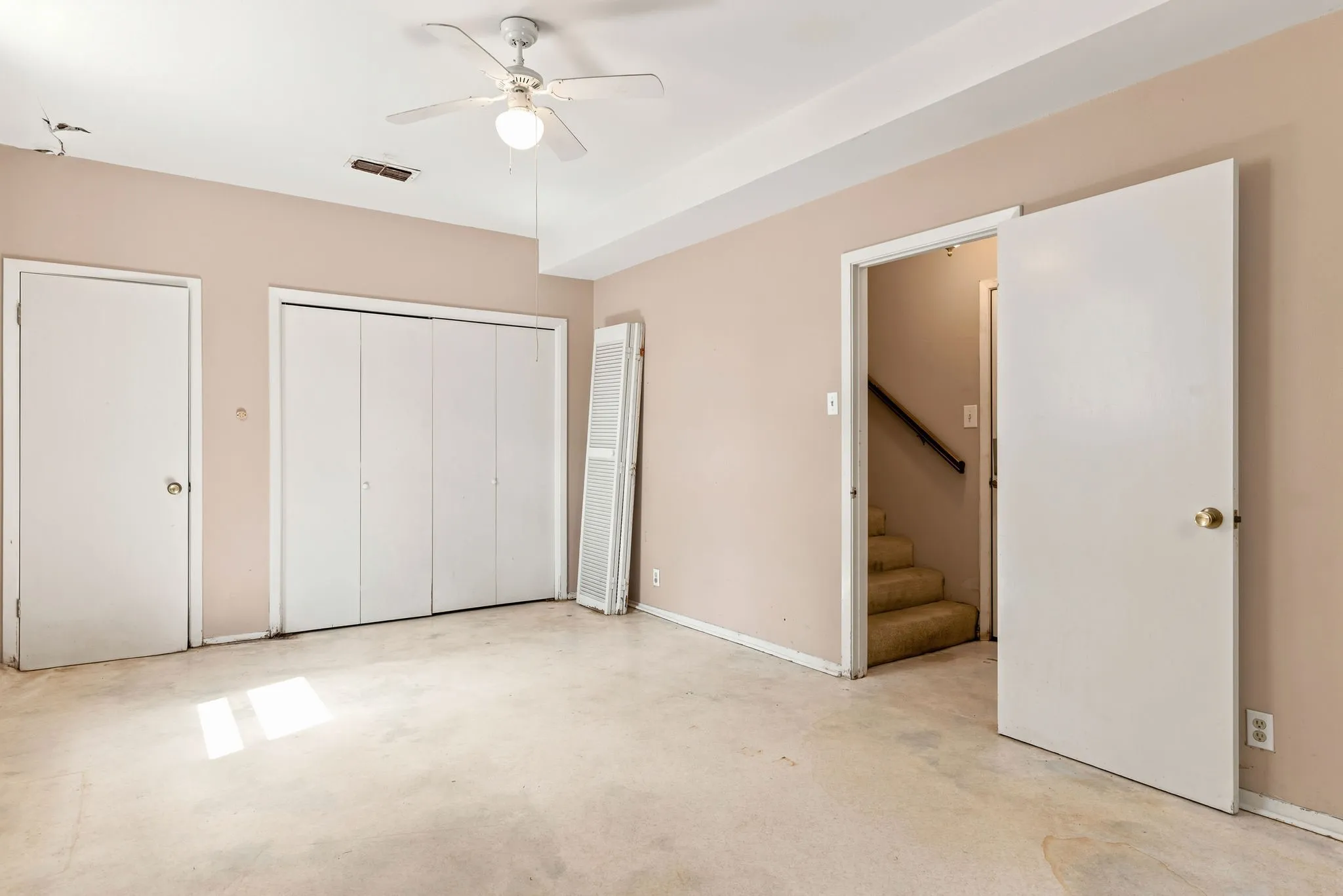 4th Bedroom/bonus room is on the lower level with the garage entrance.