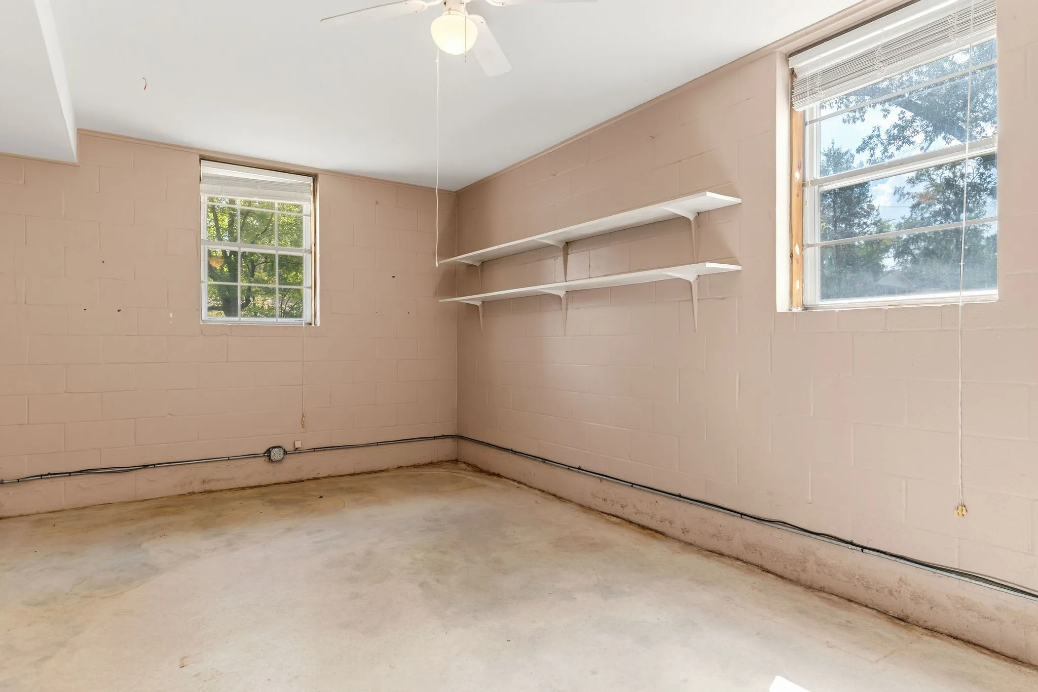 Bonus room is on the lower level with the garage entrance & can be used as a 4th bedroom.