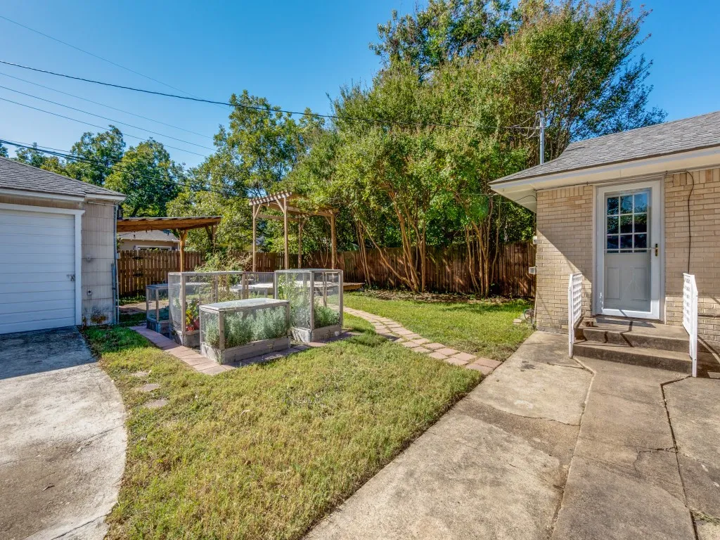 Backyard with two car garage