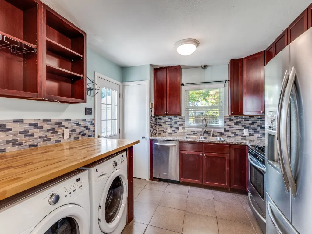 Updated kitchen with full size washer/dryer & refrigerator.
