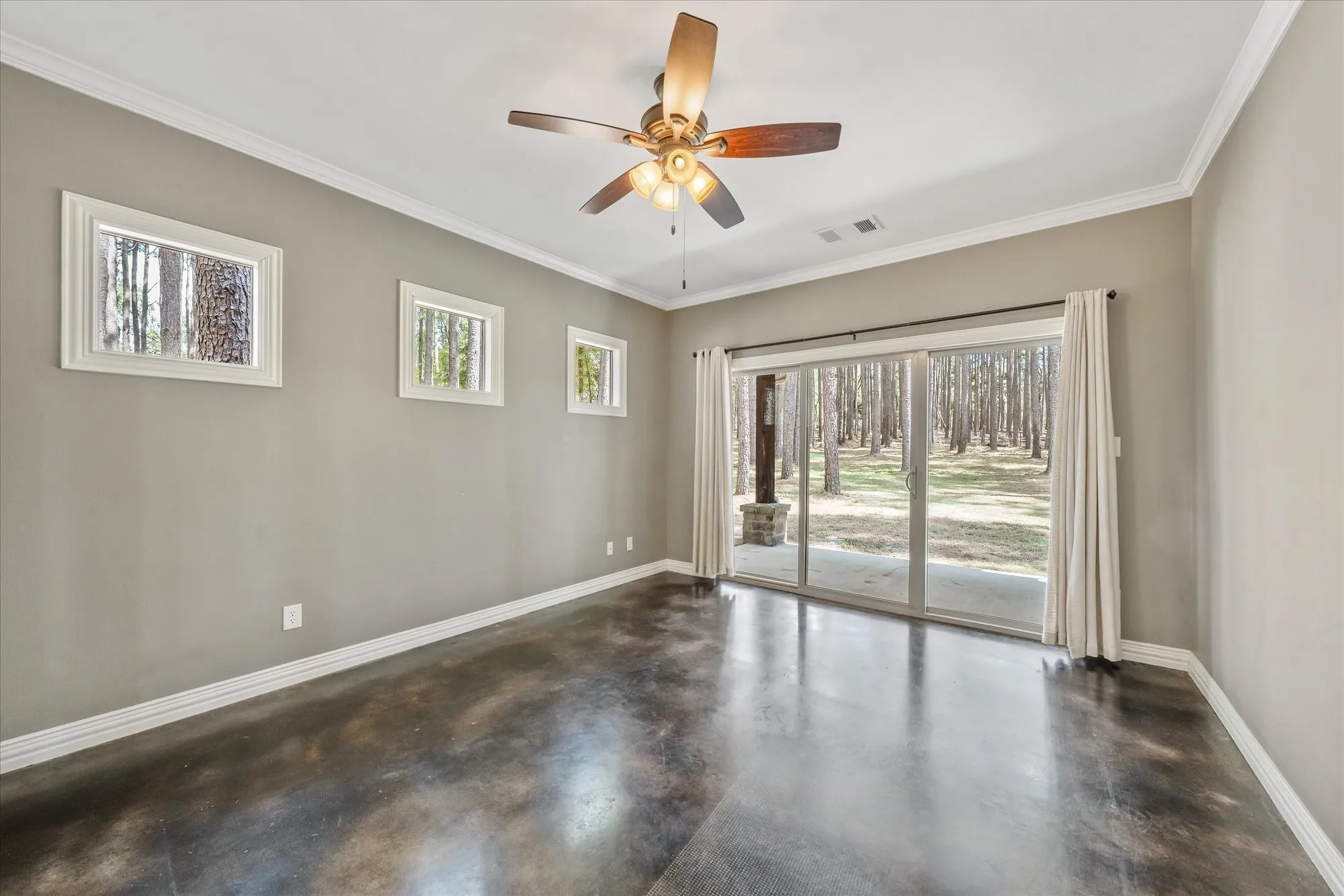 Primary Bedroom with sliding doors to patio
