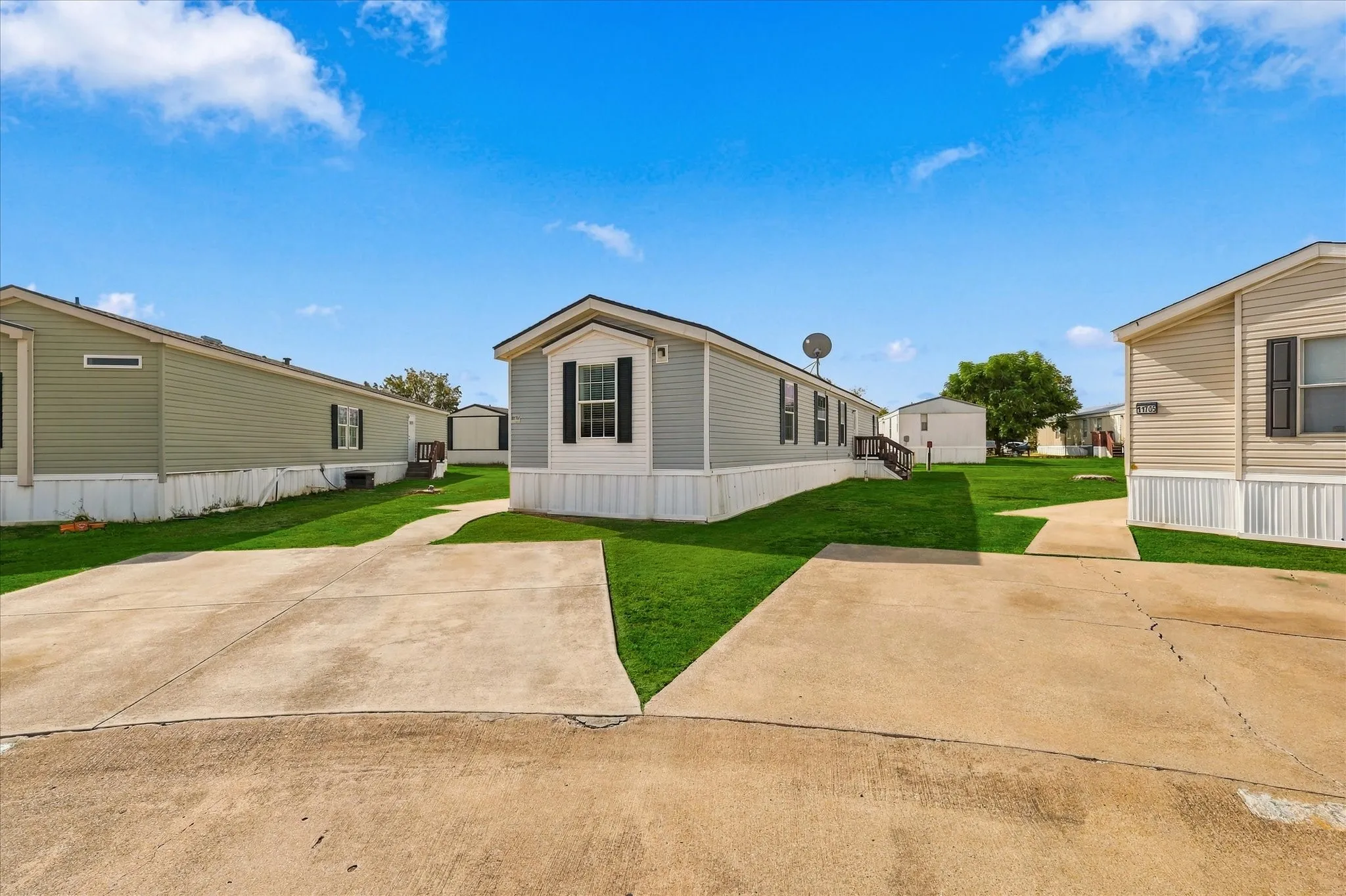Light blue siding exterior with white trim