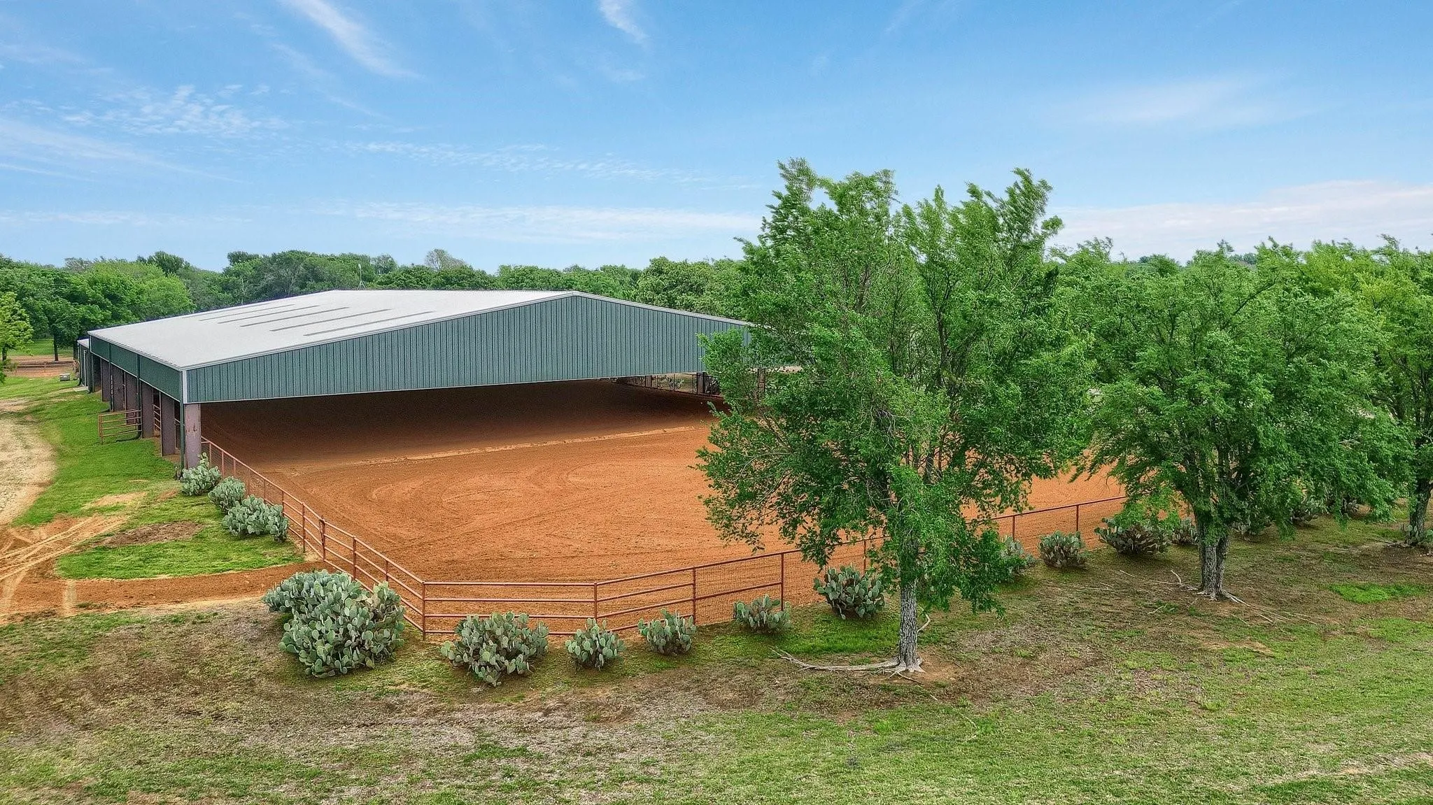 View of outbuilding featuring a covered structure