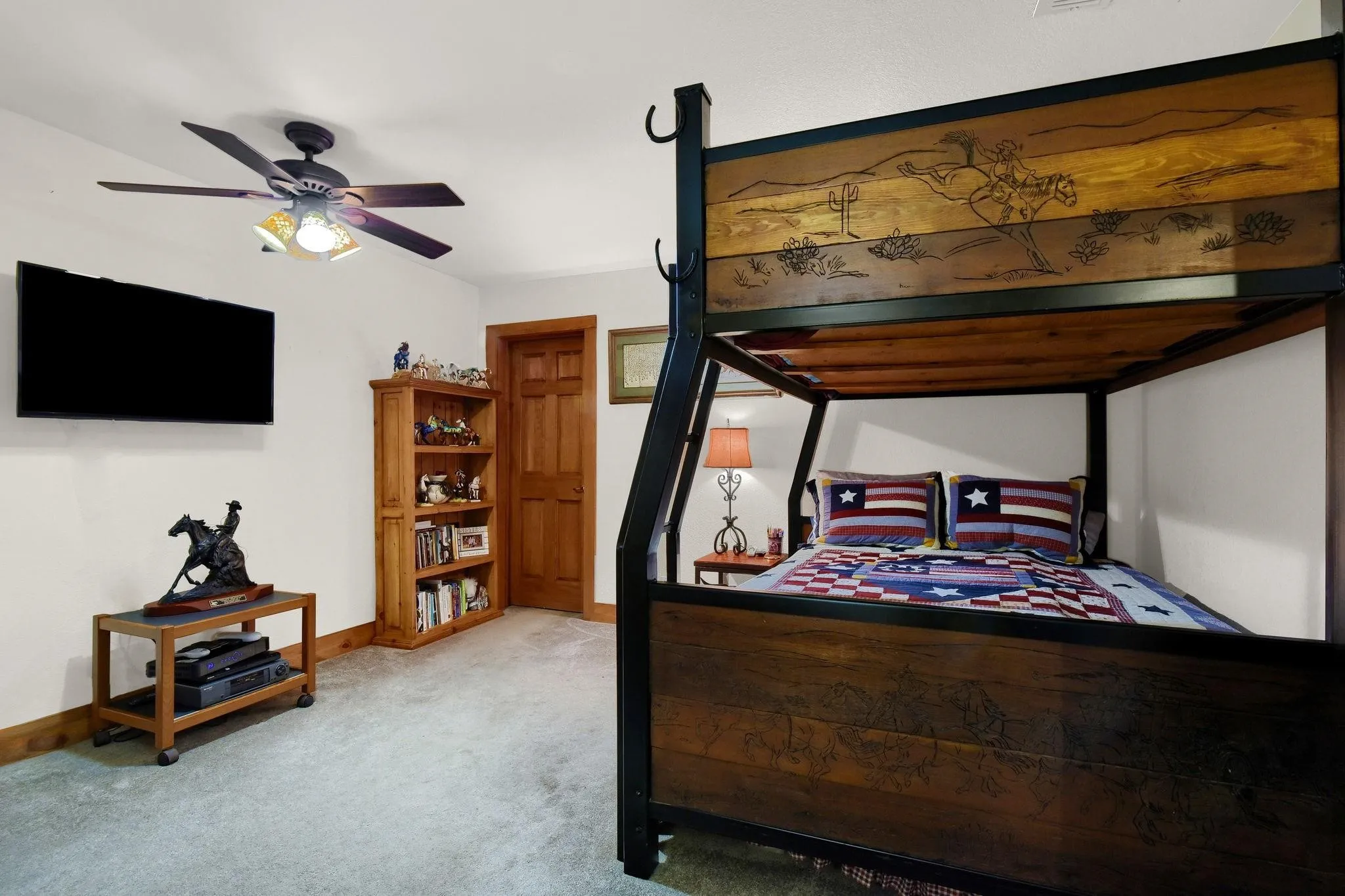 Bedroom featuring carpet flooring and ceiling fan