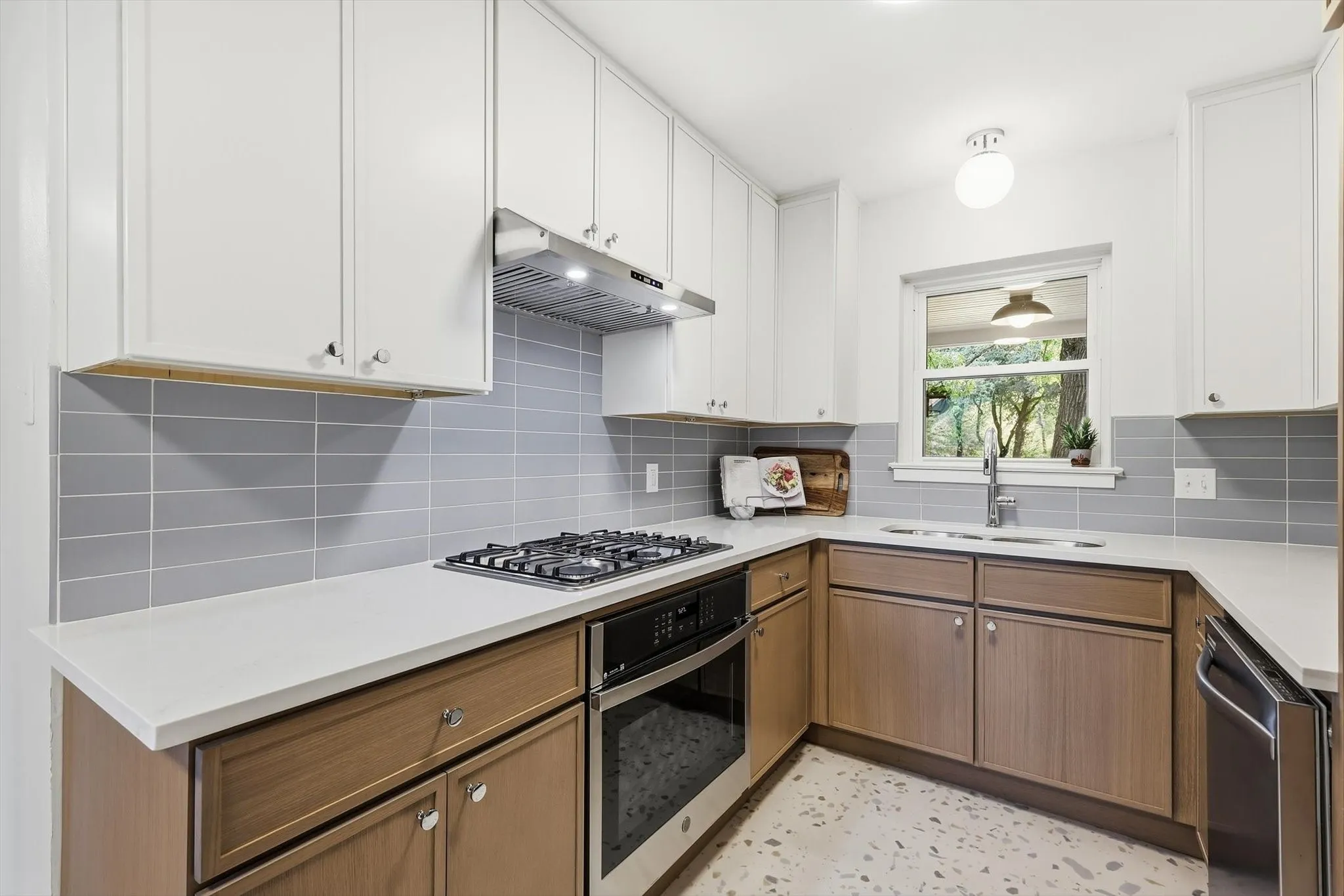 Completely new kitchen with gas cooktop and quartz countertops