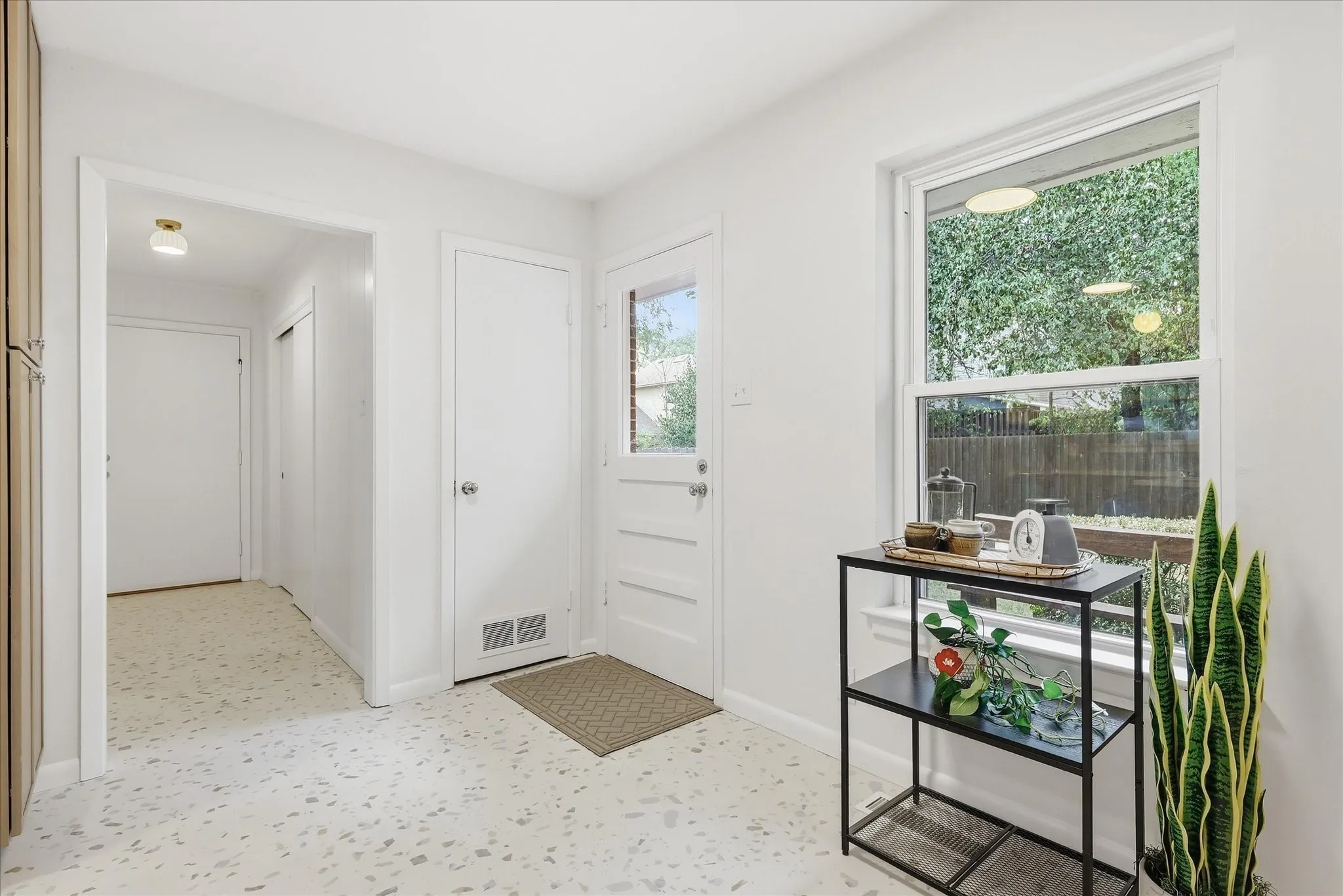 Breakfast nook off of kitchen could be a great spot for a coffee bar