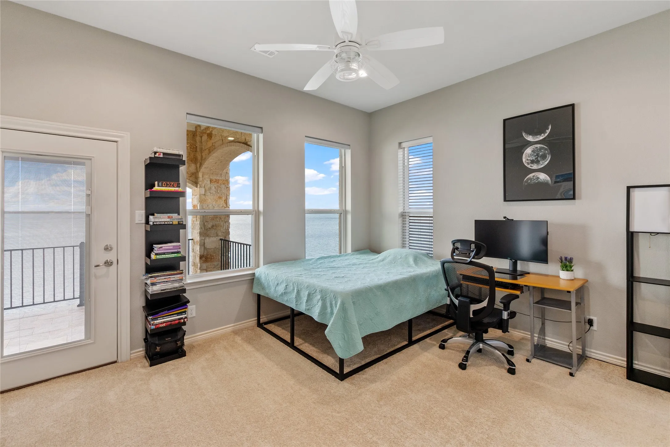 Bedroom 4 en suite with full bath and balcony access