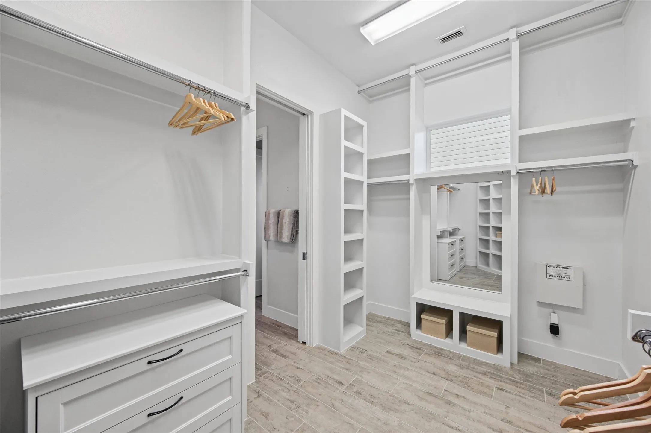 Primary Walk-in Closet - adjacent to Laundry