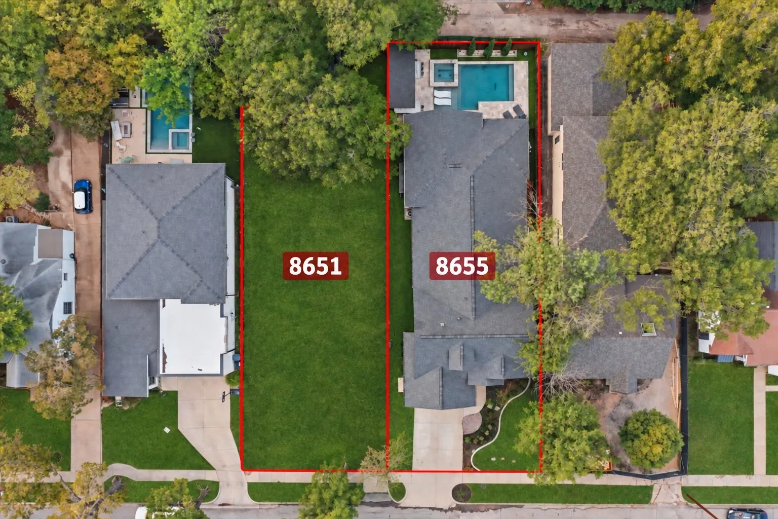 Also for sale, the vacant lot next door at 8651 Forest Hills Blvd