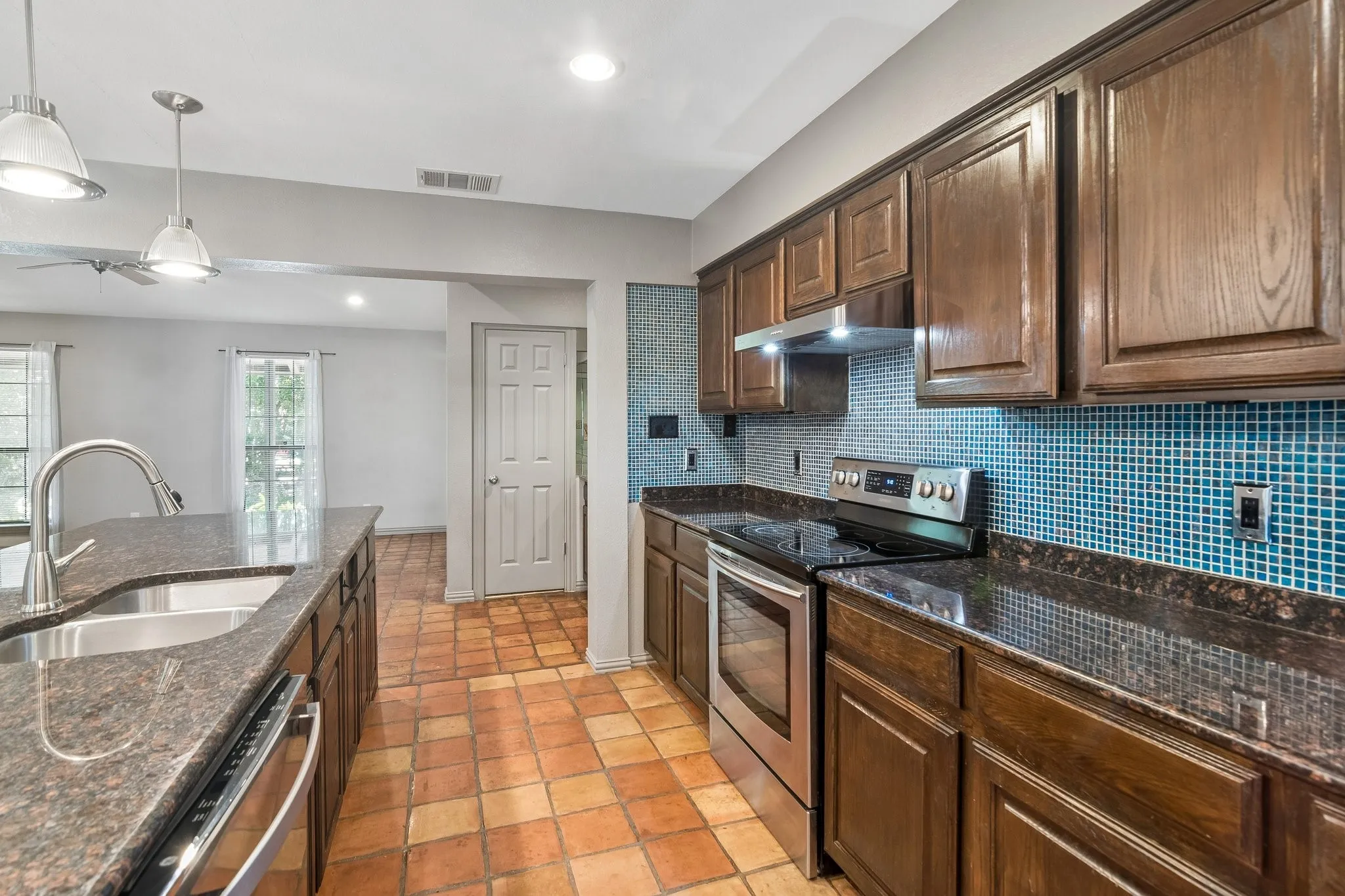 Great counter tops, designer lighting and stainless steel appliances