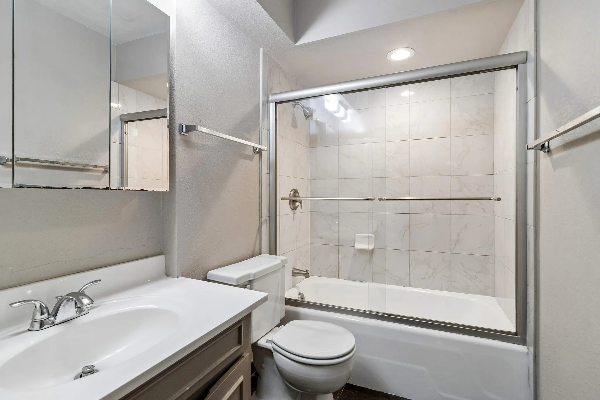 Bathroom with tub enclosure