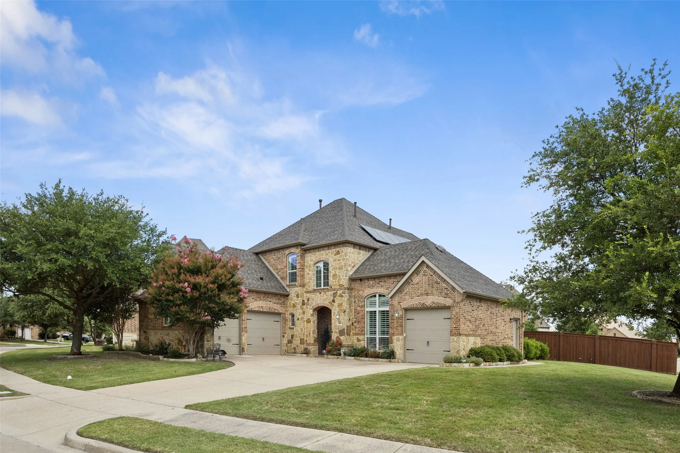 Brick and stone exterior with arched entryways