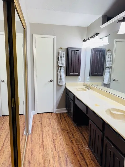 Primary Bathroom featuring double vanity
