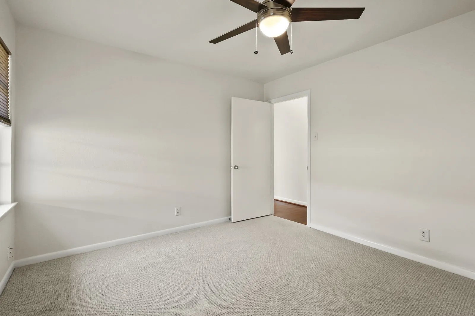 Neutral-toned carpeting throughout