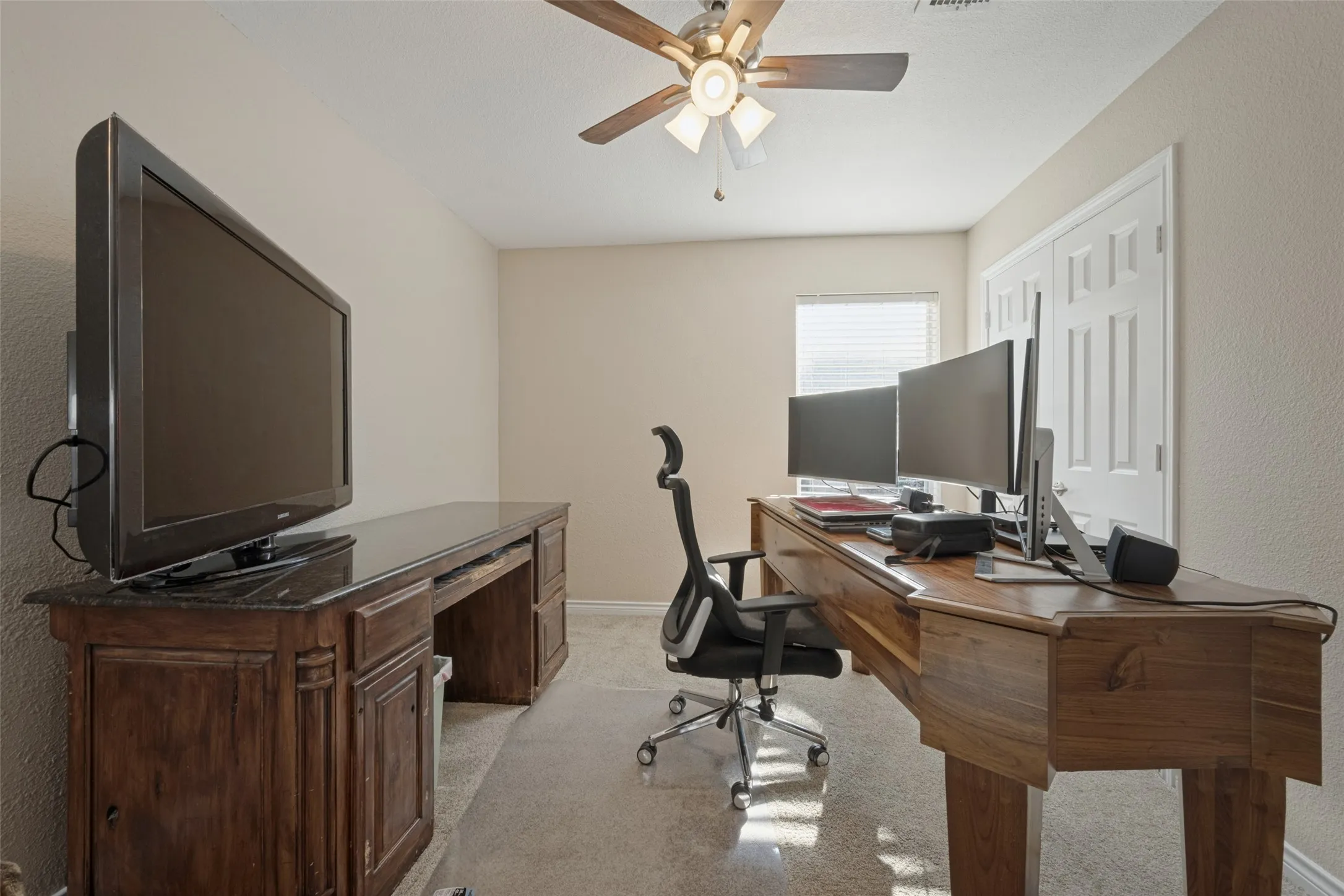 bedroom being used as an office
