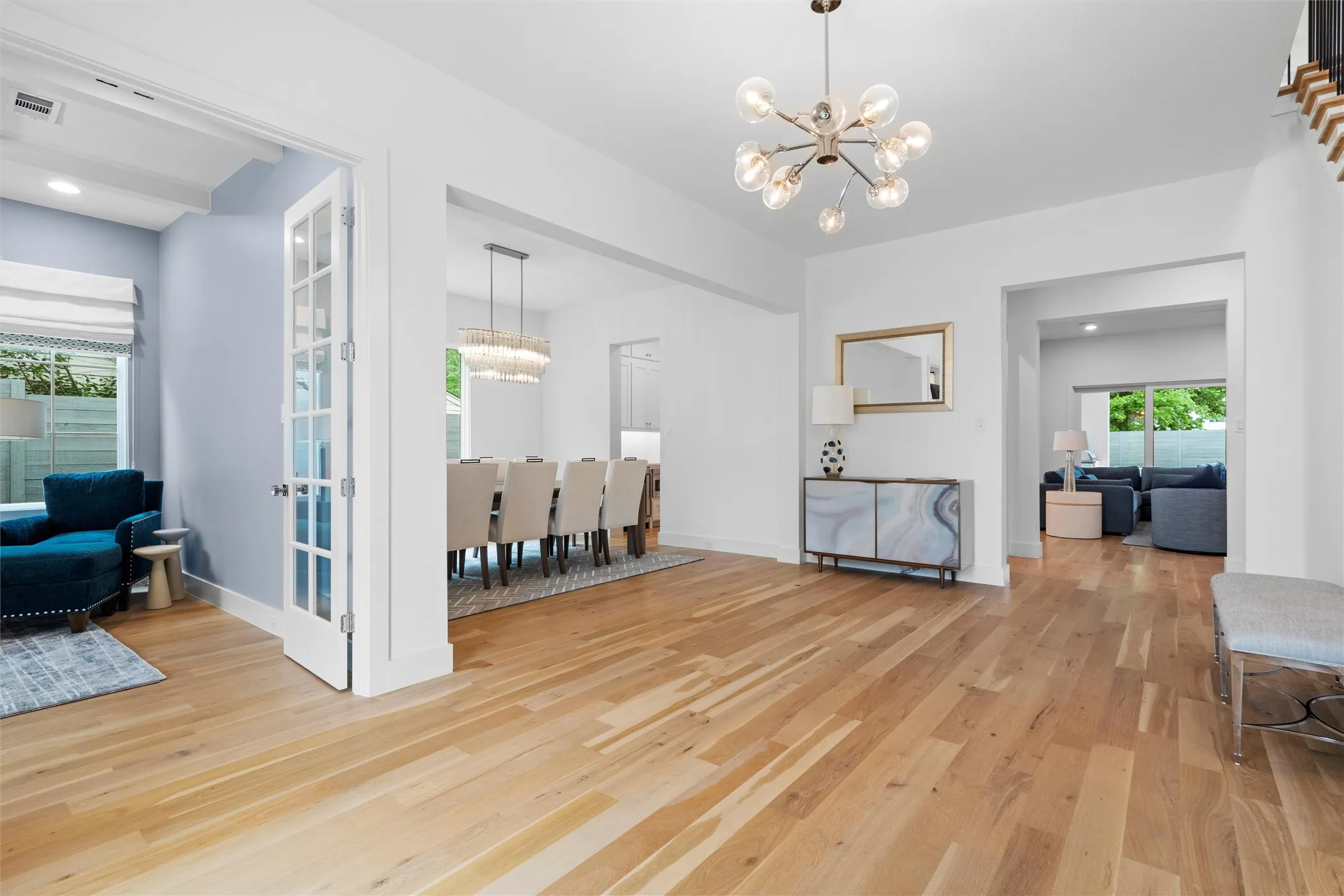 As your guests enter the executive home, the office is on the left, followed by the formal dining room, and access to the formal living/kitchen area.