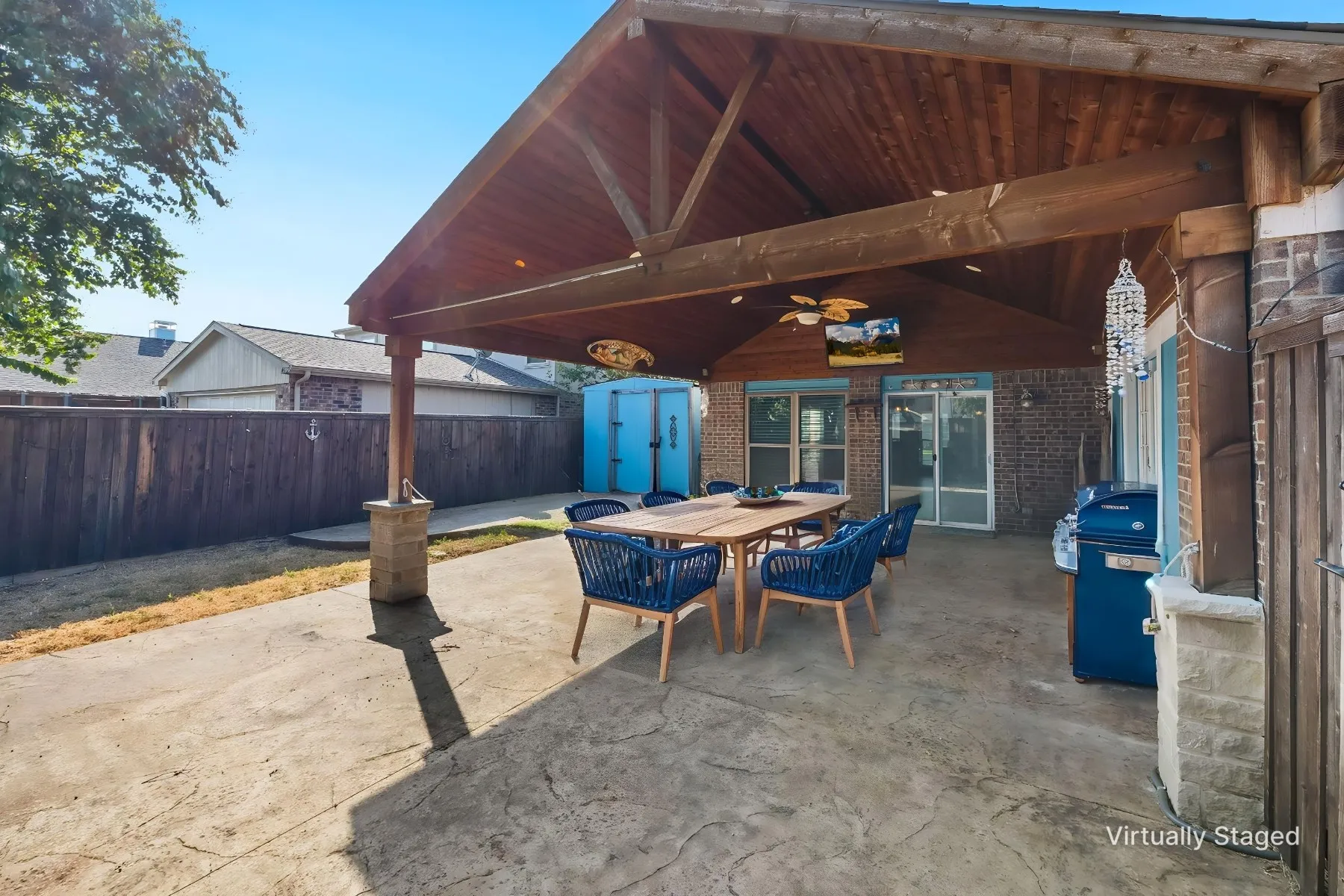 Virtually staged photo - showcasing what your outdoor entertainment space could look like.