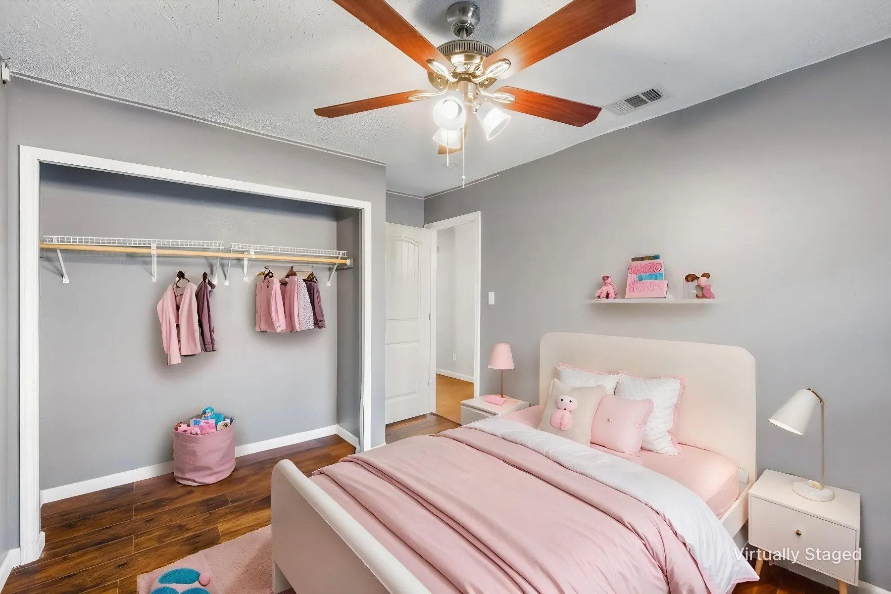 Virtually staged photo - Secondary bedroom decorated as a kid's room.