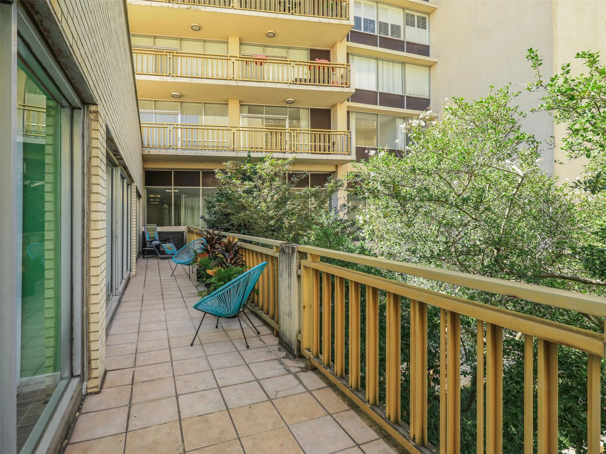 You private balcony spans the entire length of the home and has access from each room.