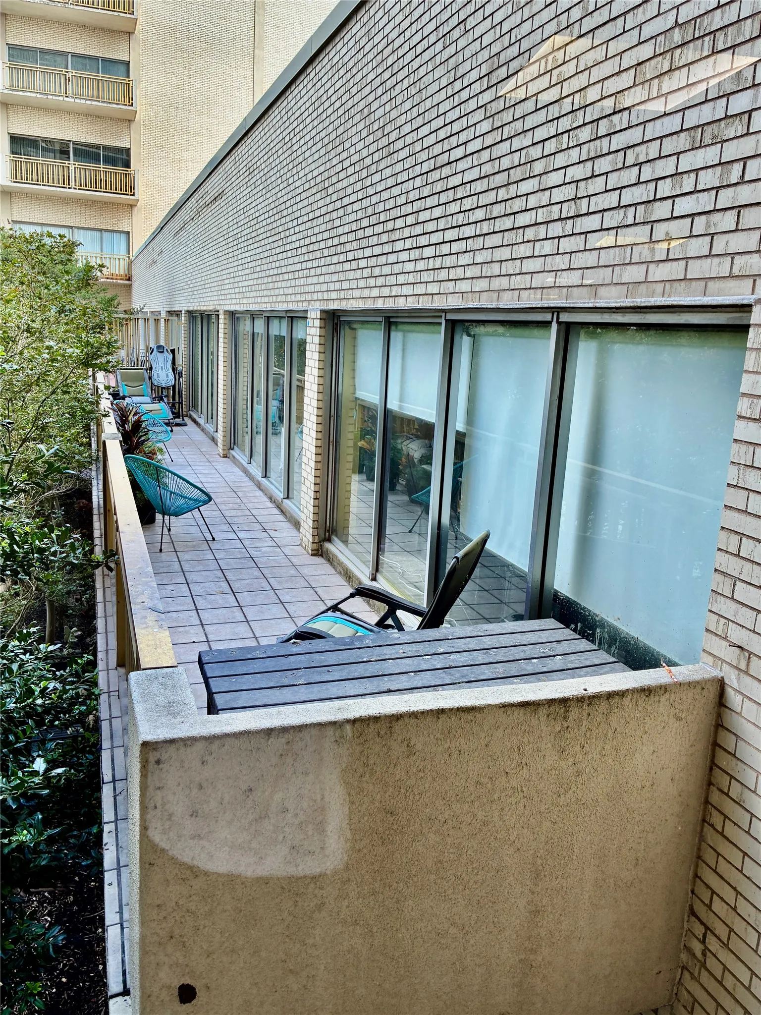 Another view of your huge private balcony. NO NEIGHBORS above you! This garden level home has only 2 stories!