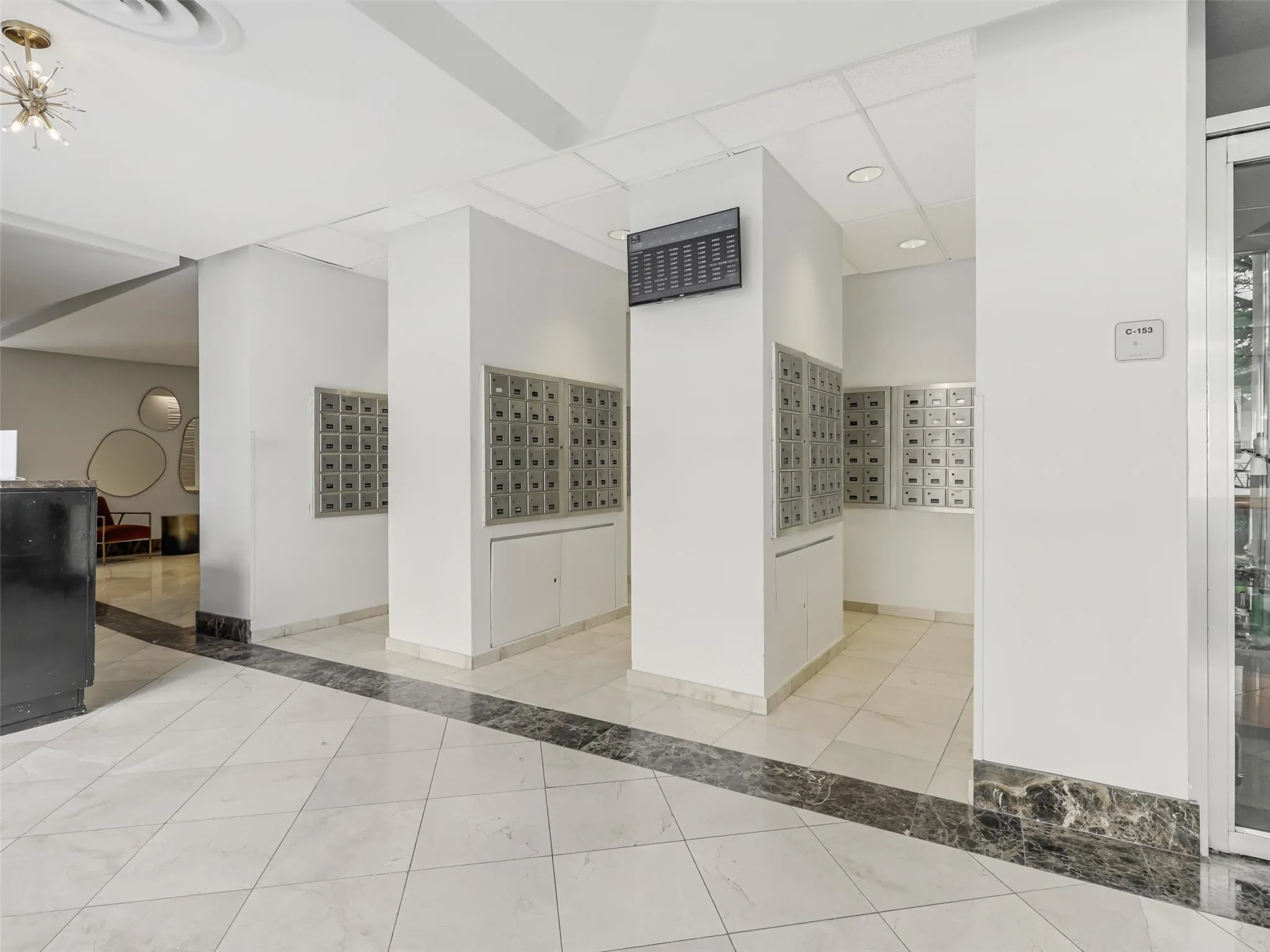 The mailroom is conveniently located directly across from the front desk (with 24/7 coverage) and by the elevators.