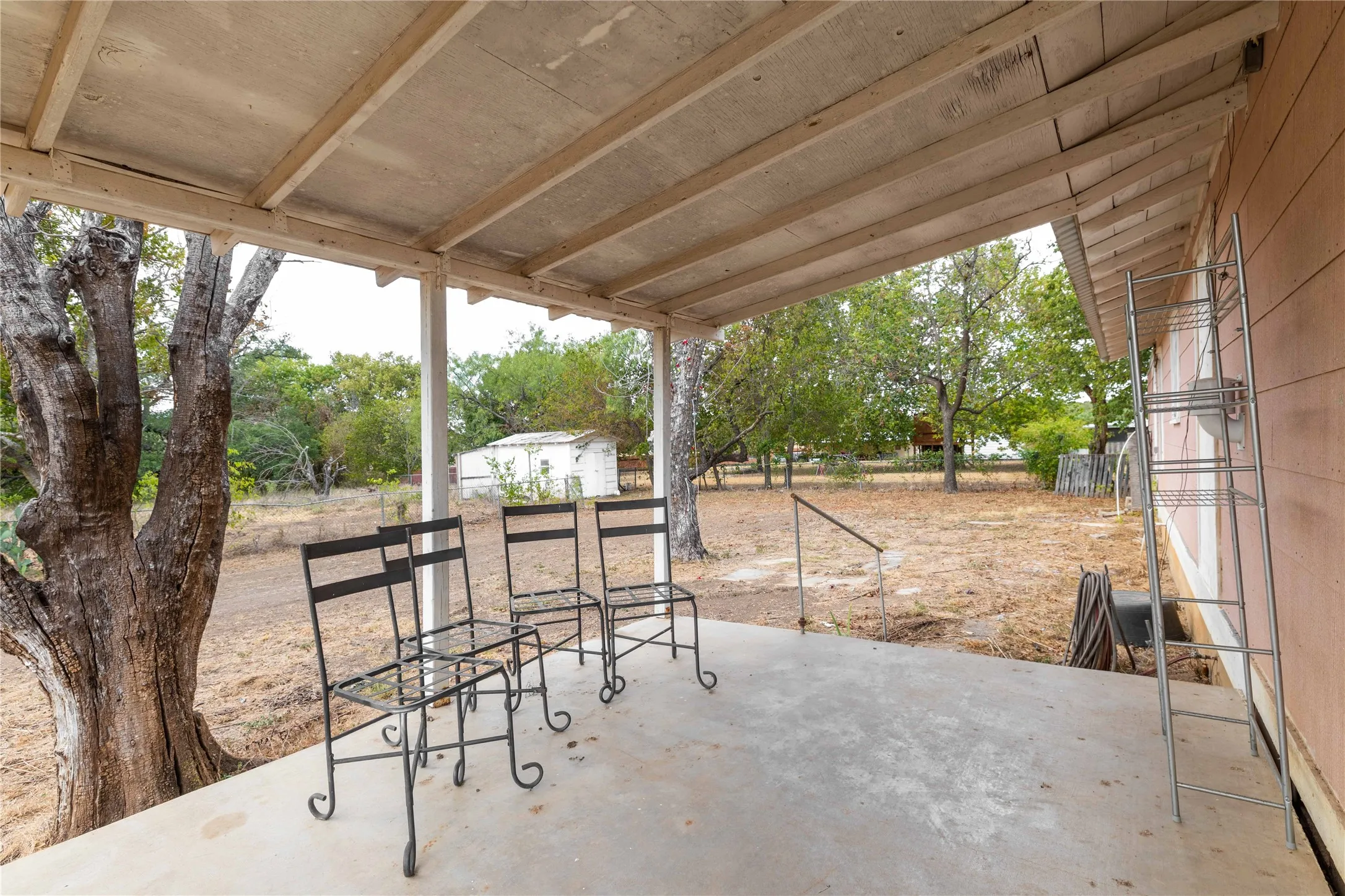 Covered patio off of 3rd bedroom