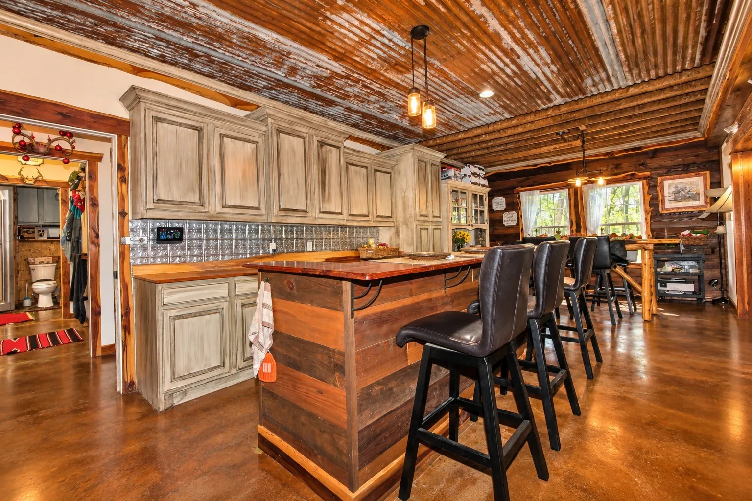 Expansive property featuring a mix of open land and mature tree coverage