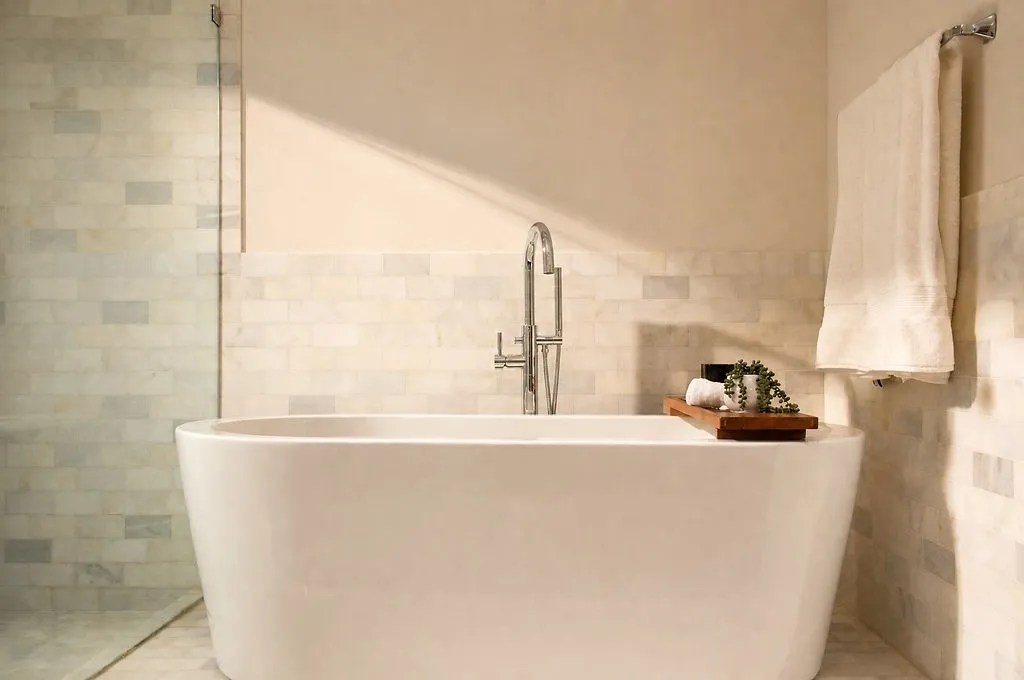 The deep soaking tub invites you to sit back and recharge after a busy day