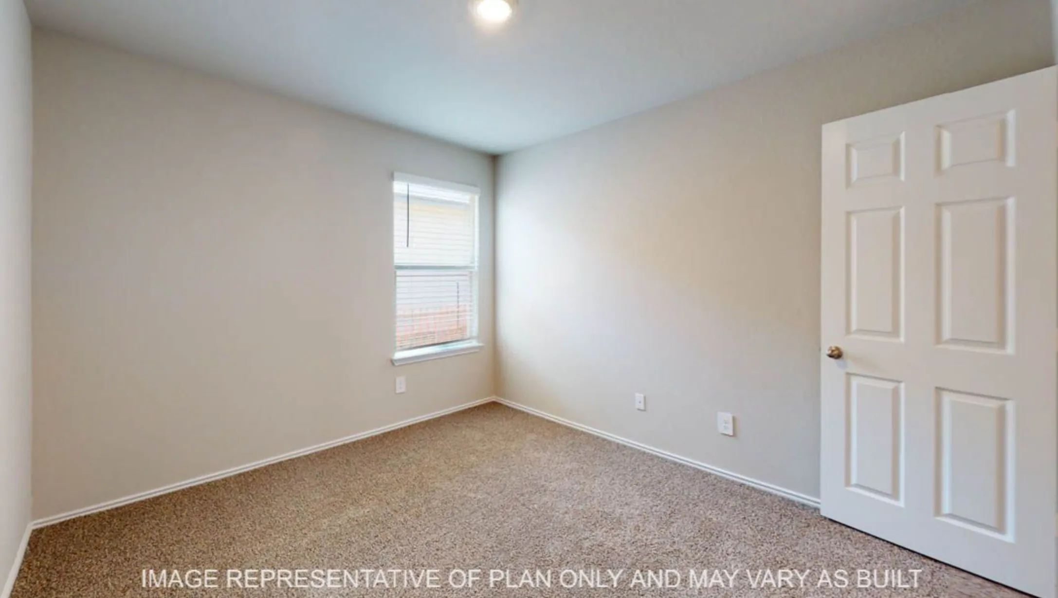 Neutral-toned walls, carpet flooring, window with blinds, and white panel door